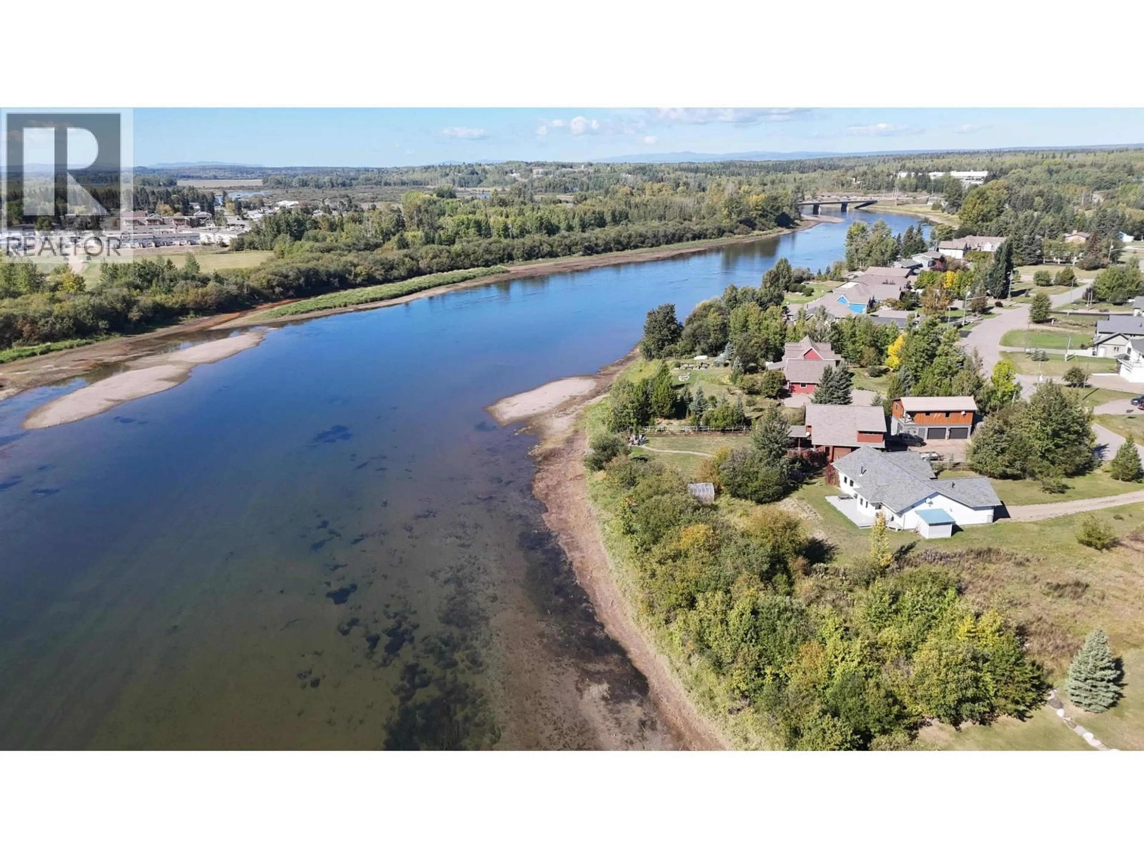 A pic from outside/outdoor area/front of a property/back of a property/a pic from drone, water/lake/river/ocean view for 608 REID DRIVE, Vanderhoof British Columbia V0J3A2