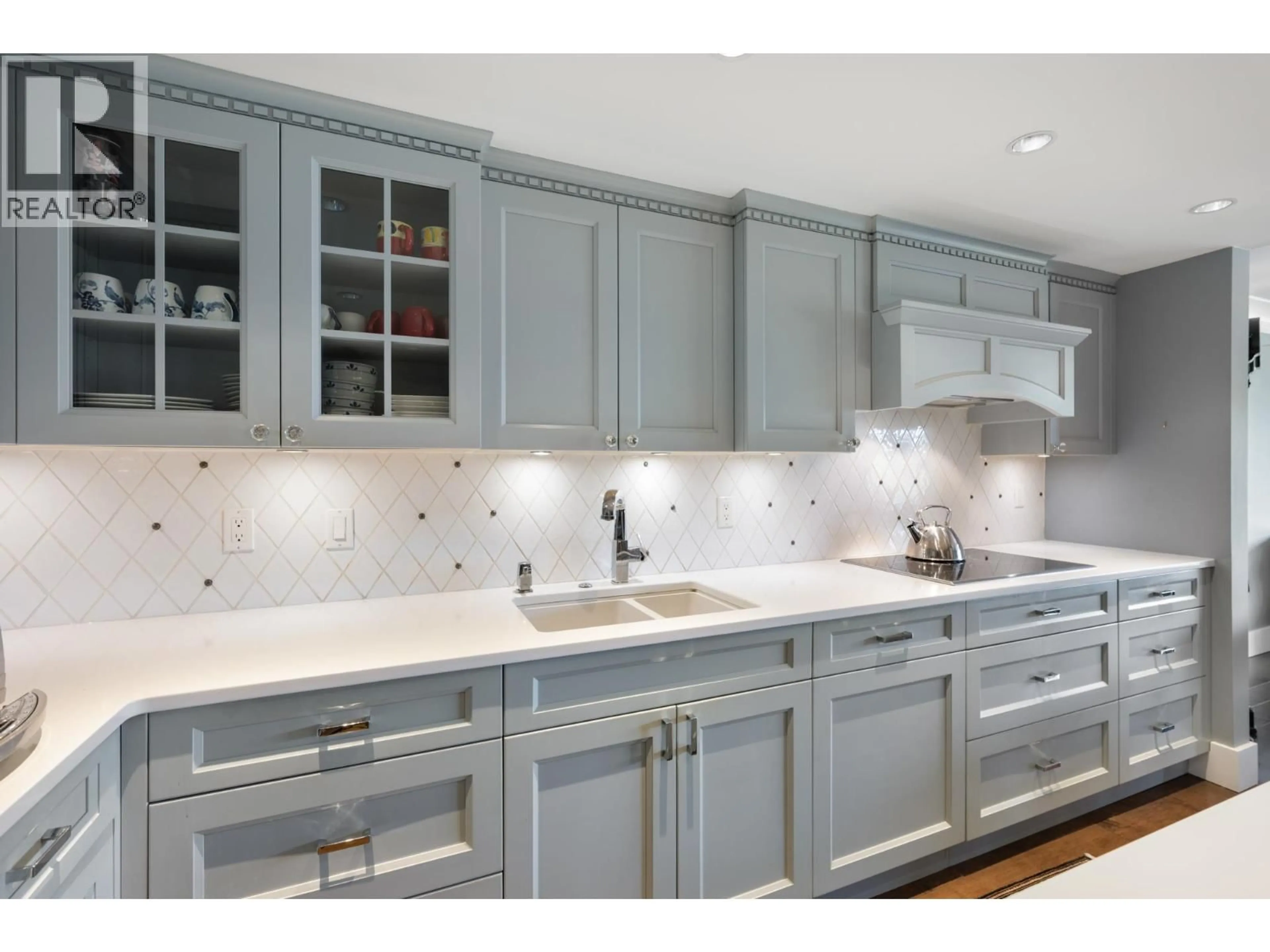 Contemporary kitchen, ceramic/tile floor for 205 - 1470 PENNYFARTHING DRIVE, Vancouver British Columbia V6J4Y2