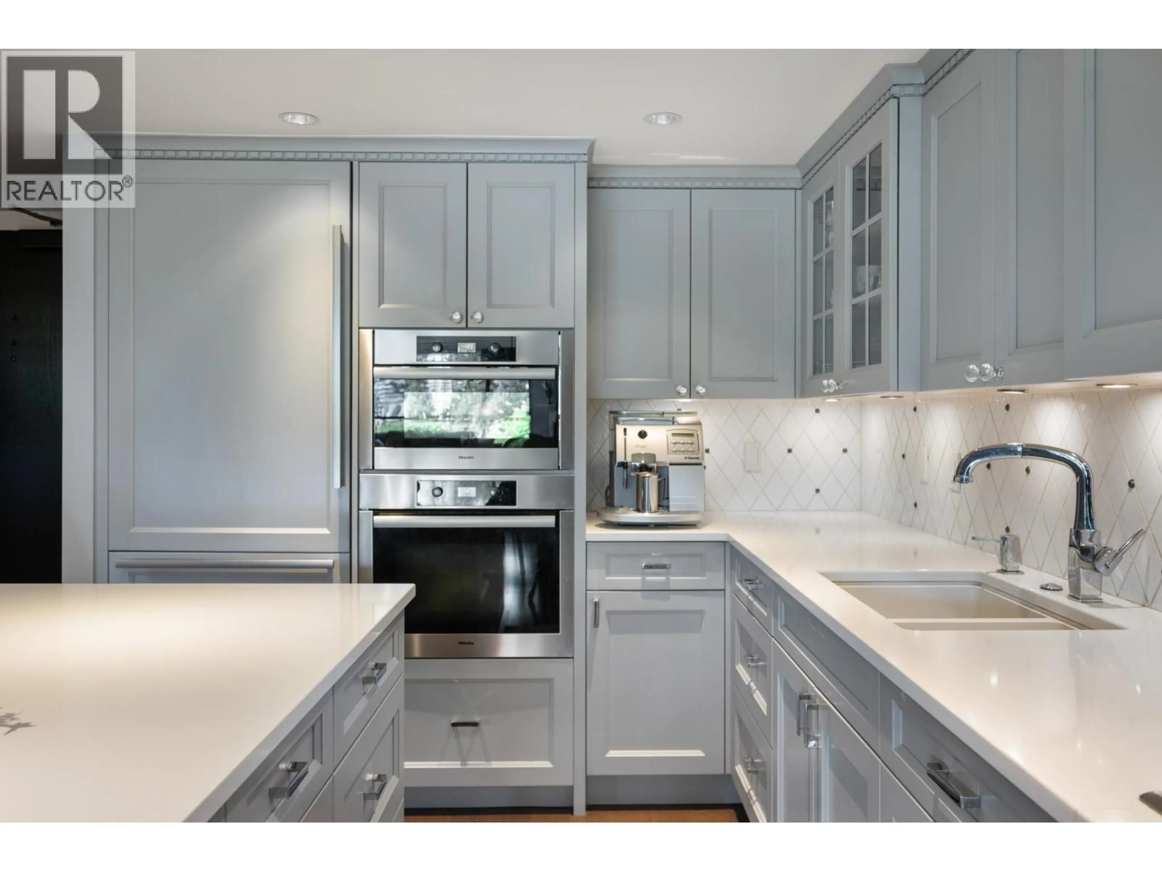 Contemporary kitchen, ceramic/tile floor for 205 - 1470 PENNYFARTHING DRIVE, Vancouver British Columbia V6J4Y2