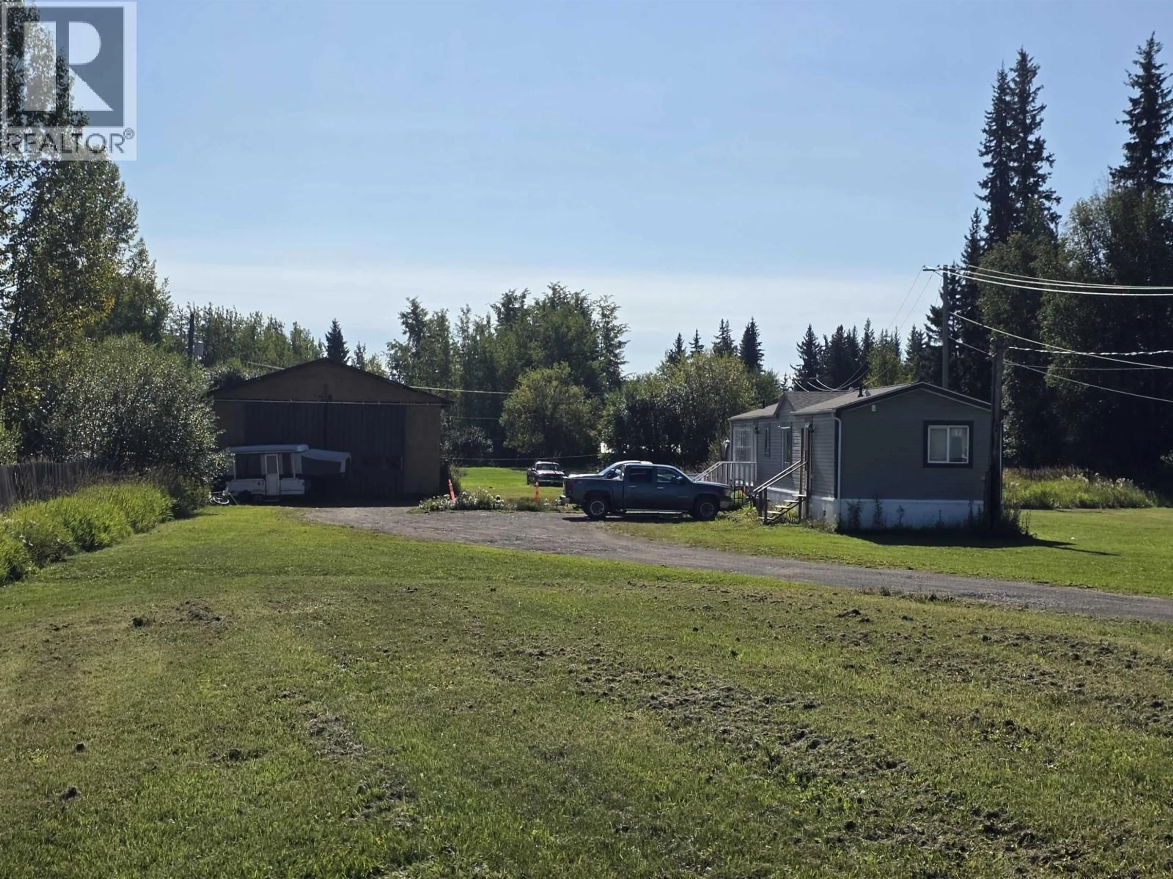 A pic from outside/outdoor area/front of a property/back of a property/a pic from drone, mountain view for 3680 SIMCOE AVENUE, Smithers British Columbia V0J2N2