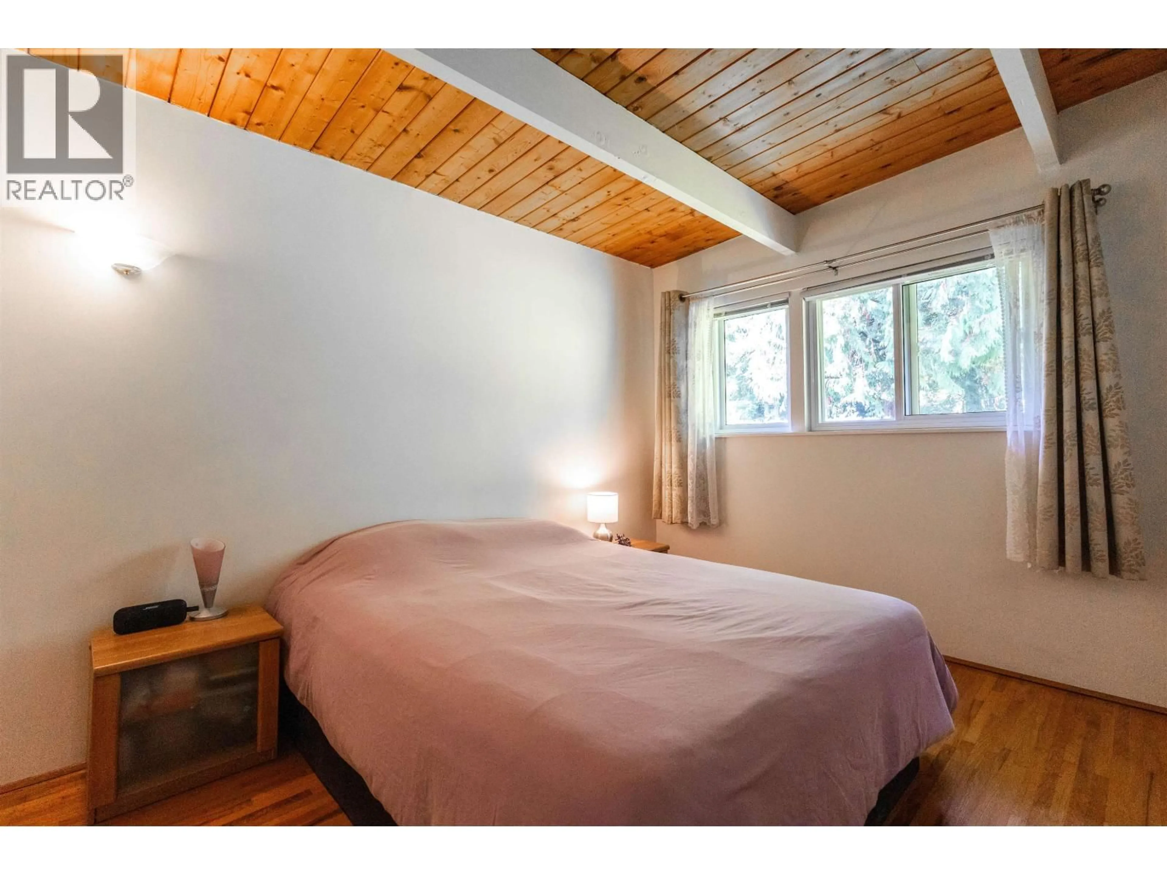 Bedroom with bed, wood/laminate floor for 3063 ROYAL AVENUE, North Vancouver British Columbia V7K1Y6