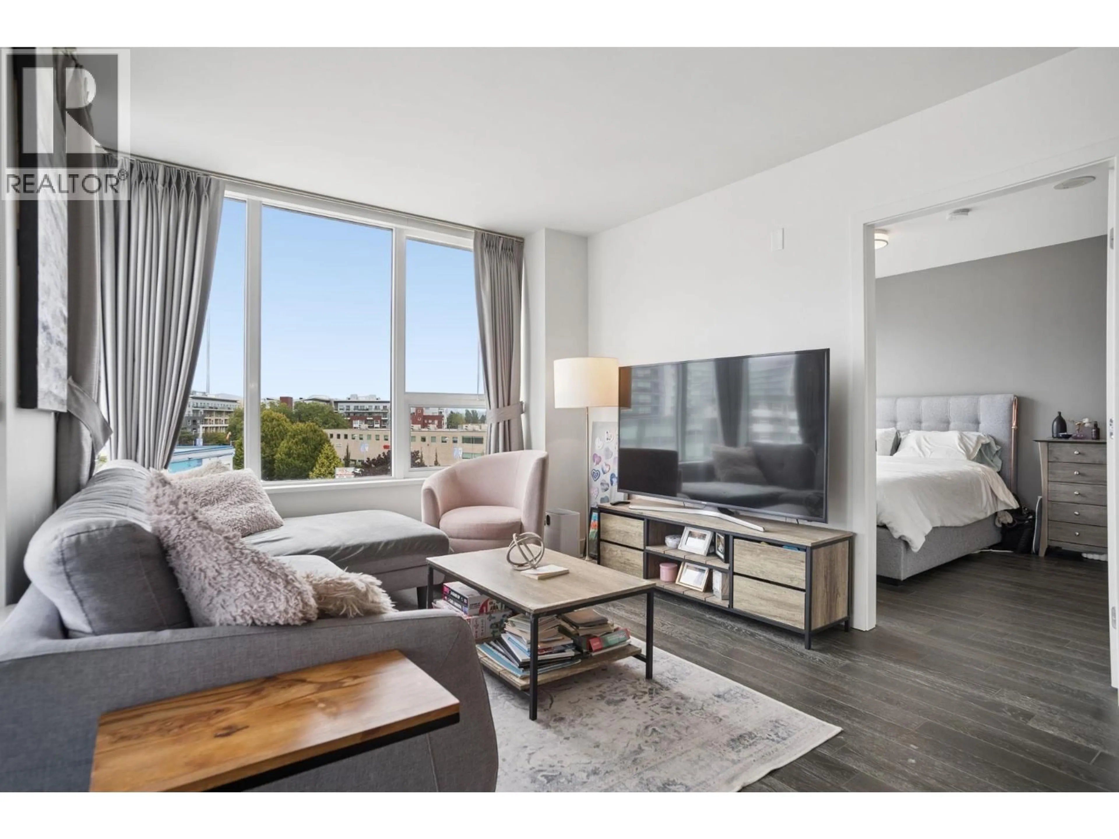 Living room with furniture, wood/laminate floor for 608 - 7488 LANSDOWNE ROAD, Richmond British Columbia V7C0B9
