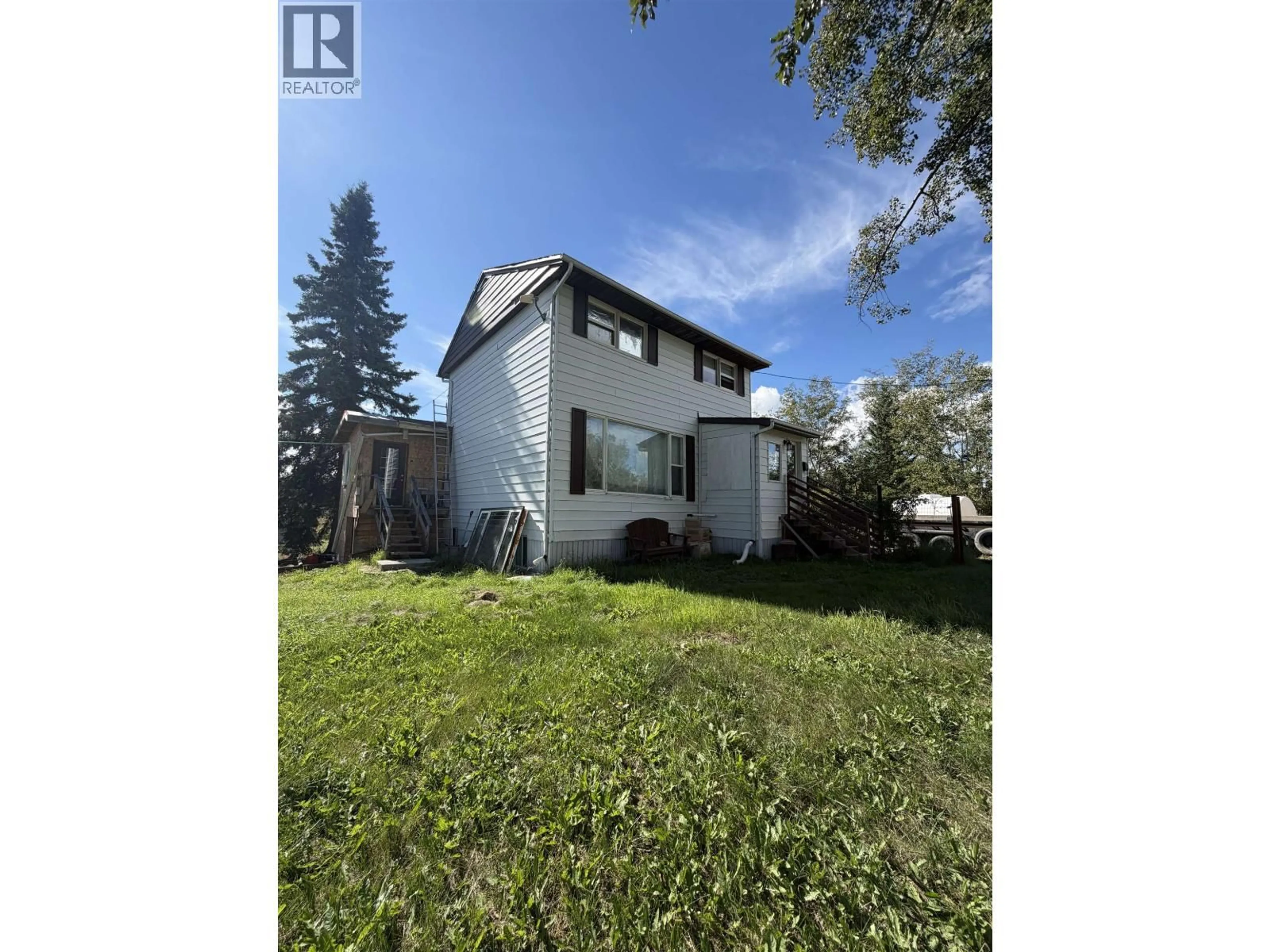 A pic from outside/outdoor area/front of a property/back of a property/a pic from drone, unknown for 7511 255 ROAD, Fort St. John British Columbia V0C1C0