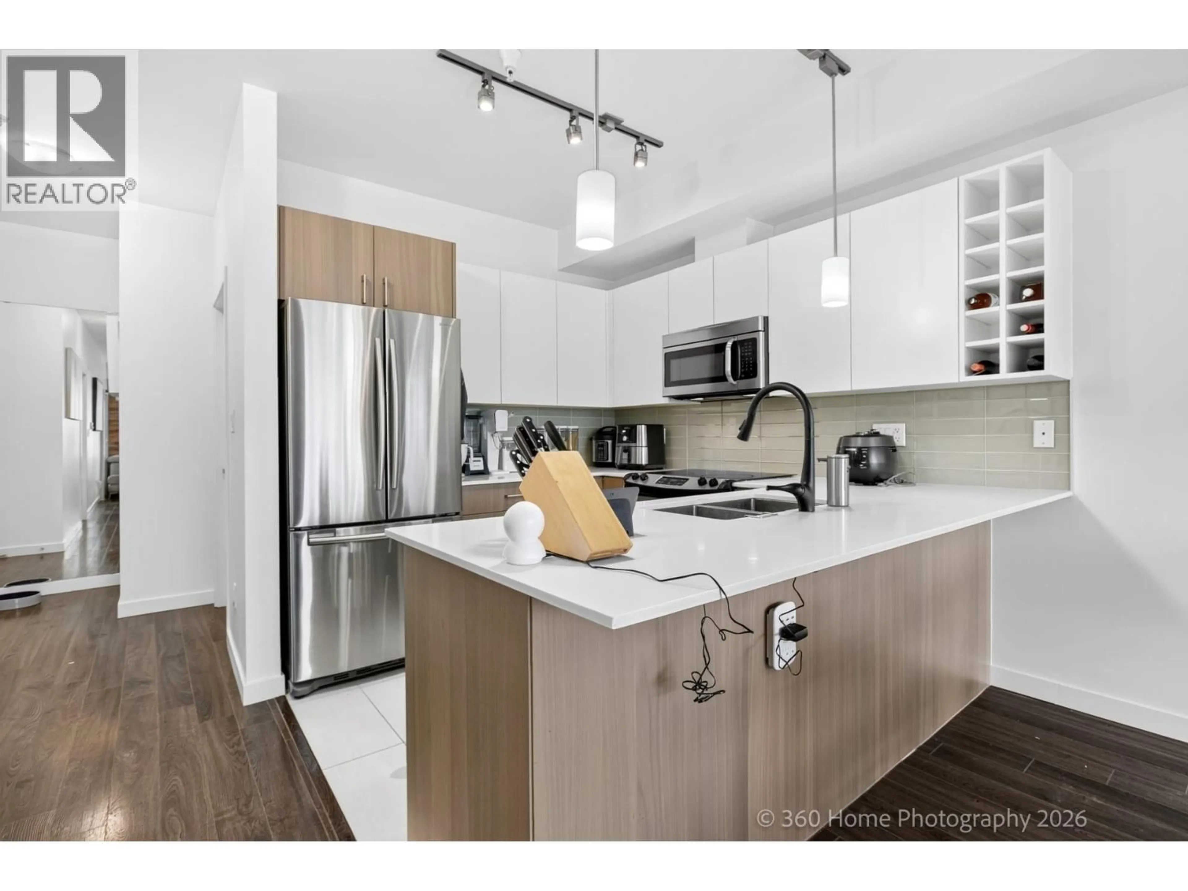 Open concept kitchen, unknown for 202 - 5288 GRIMMER STREET, Burnaby British Columbia V5H0C5