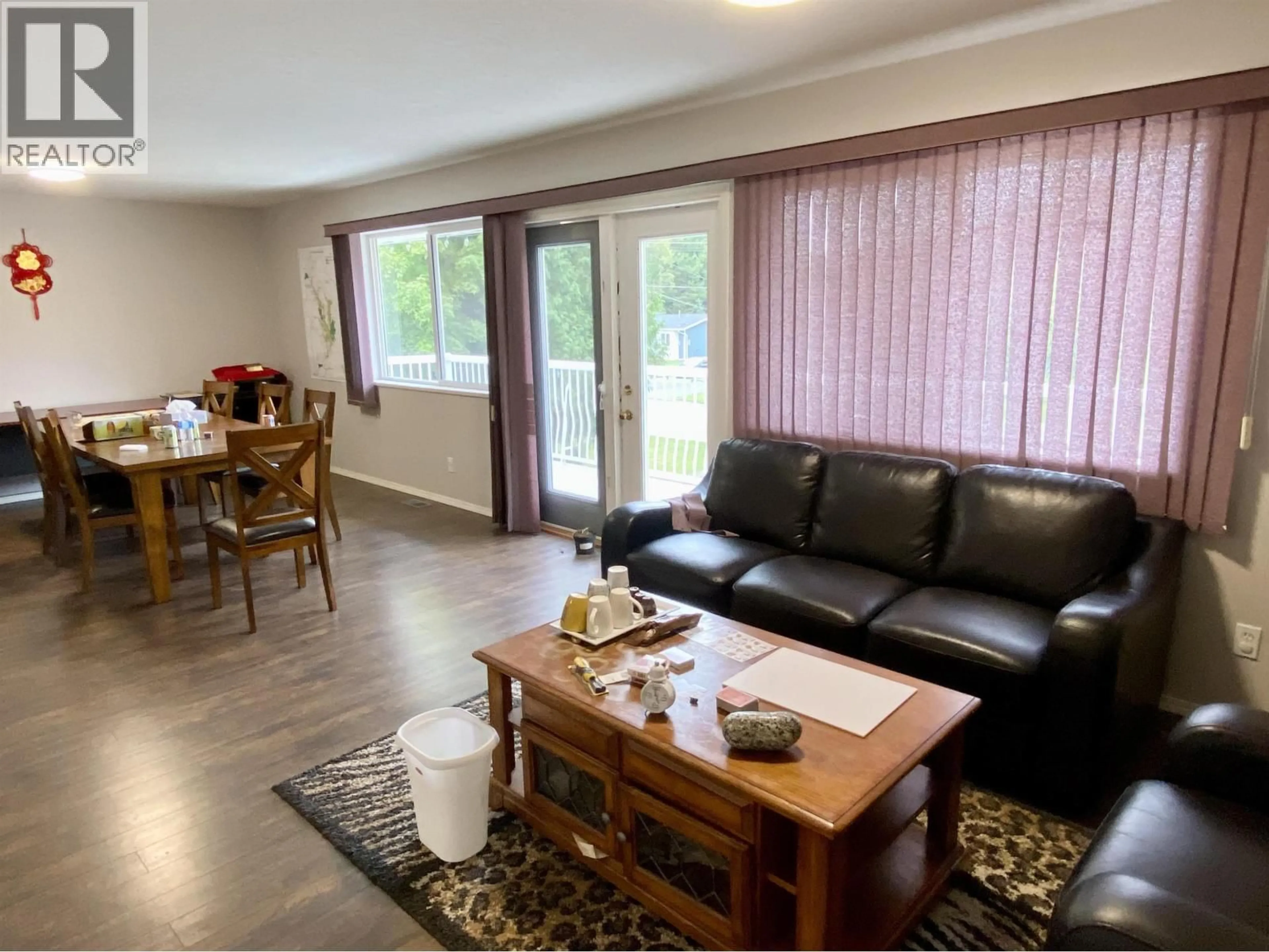 Living room with furniture, wood/laminate floor for 4839 MILLS AVENUE, Terrace British Columbia V8G1C3