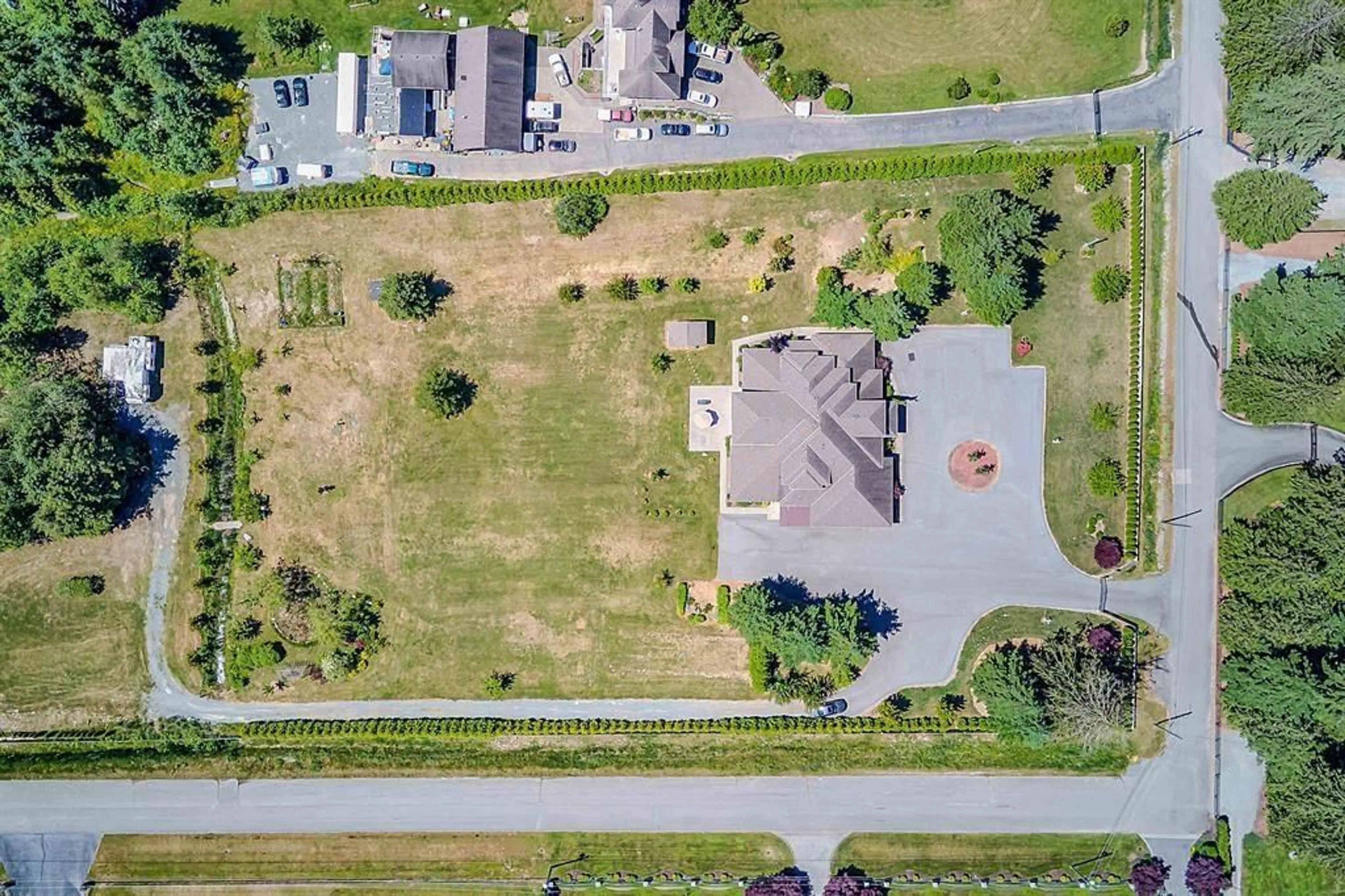 A pic from outside/outdoor area/front of a property/back of a property/a pic from drone, street for 26972 60 AVENUE, Langley British Columbia V4W1V6