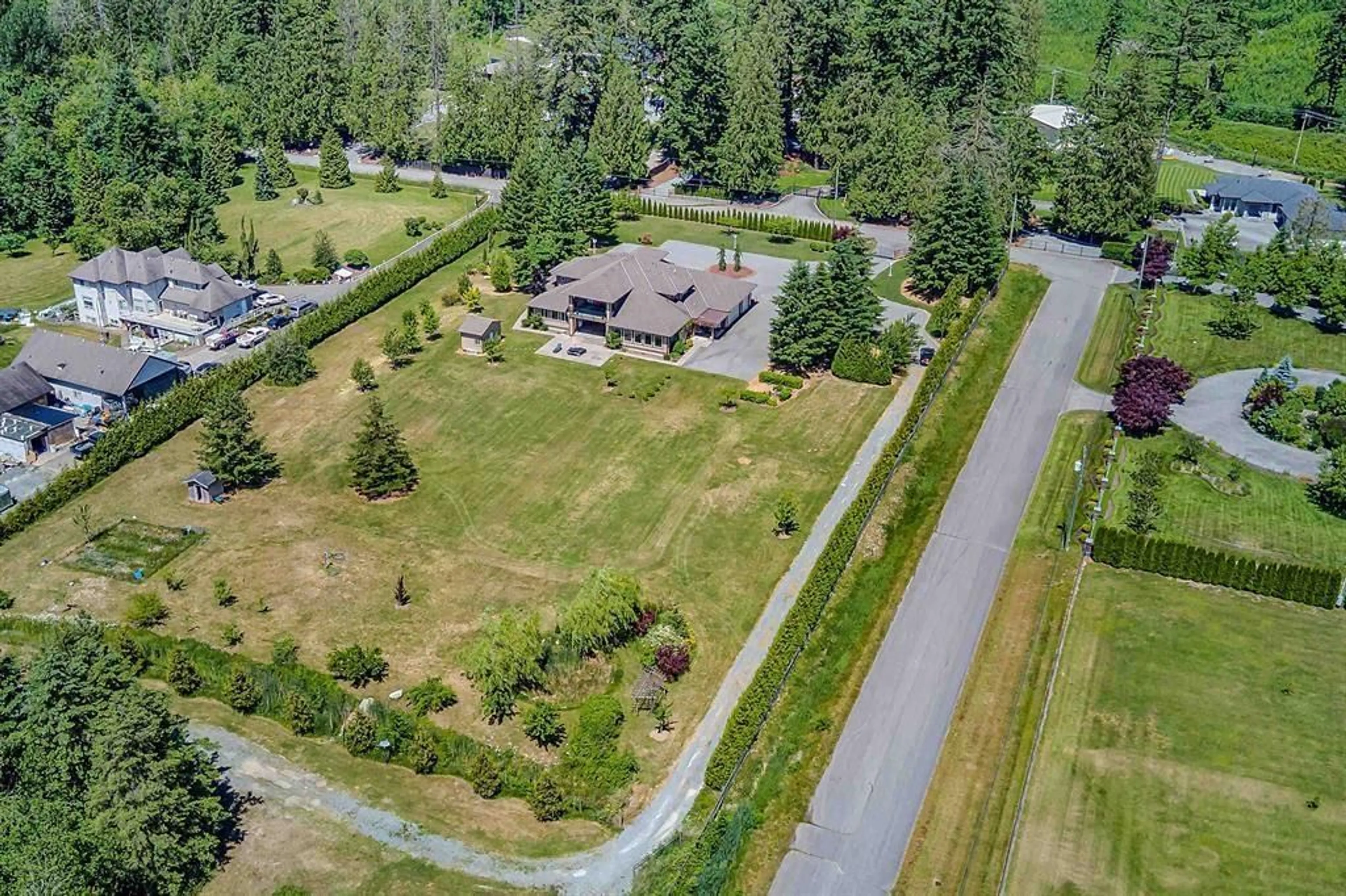 A pic from outside/outdoor area/front of a property/back of a property/a pic from drone, unknown for 26972 60 AVENUE, Langley British Columbia V4W1V6