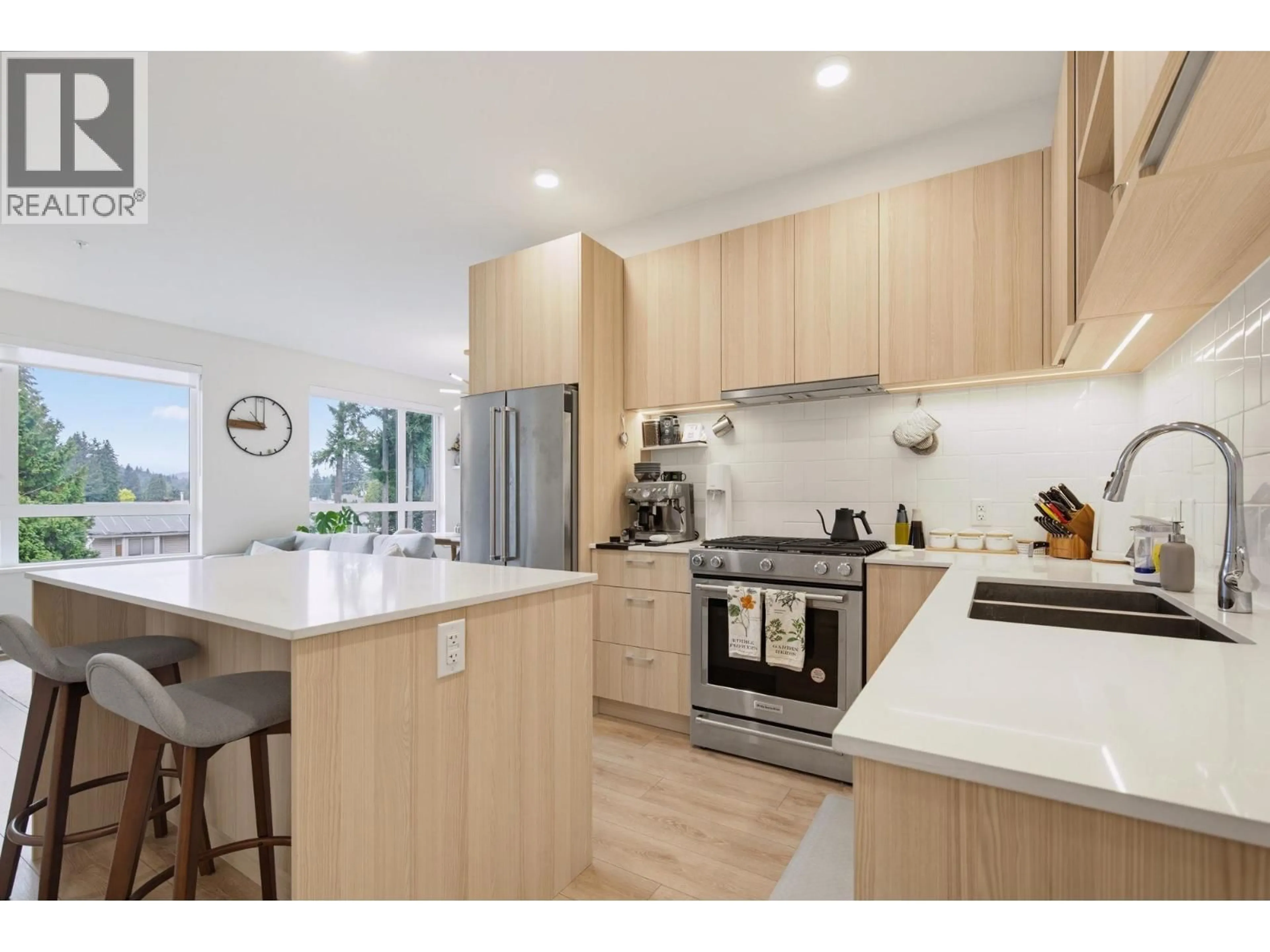Open concept kitchen, wood/laminate floor for 316 - 735 ANSKAR COURT, Coquitlam British Columbia V3J0L7