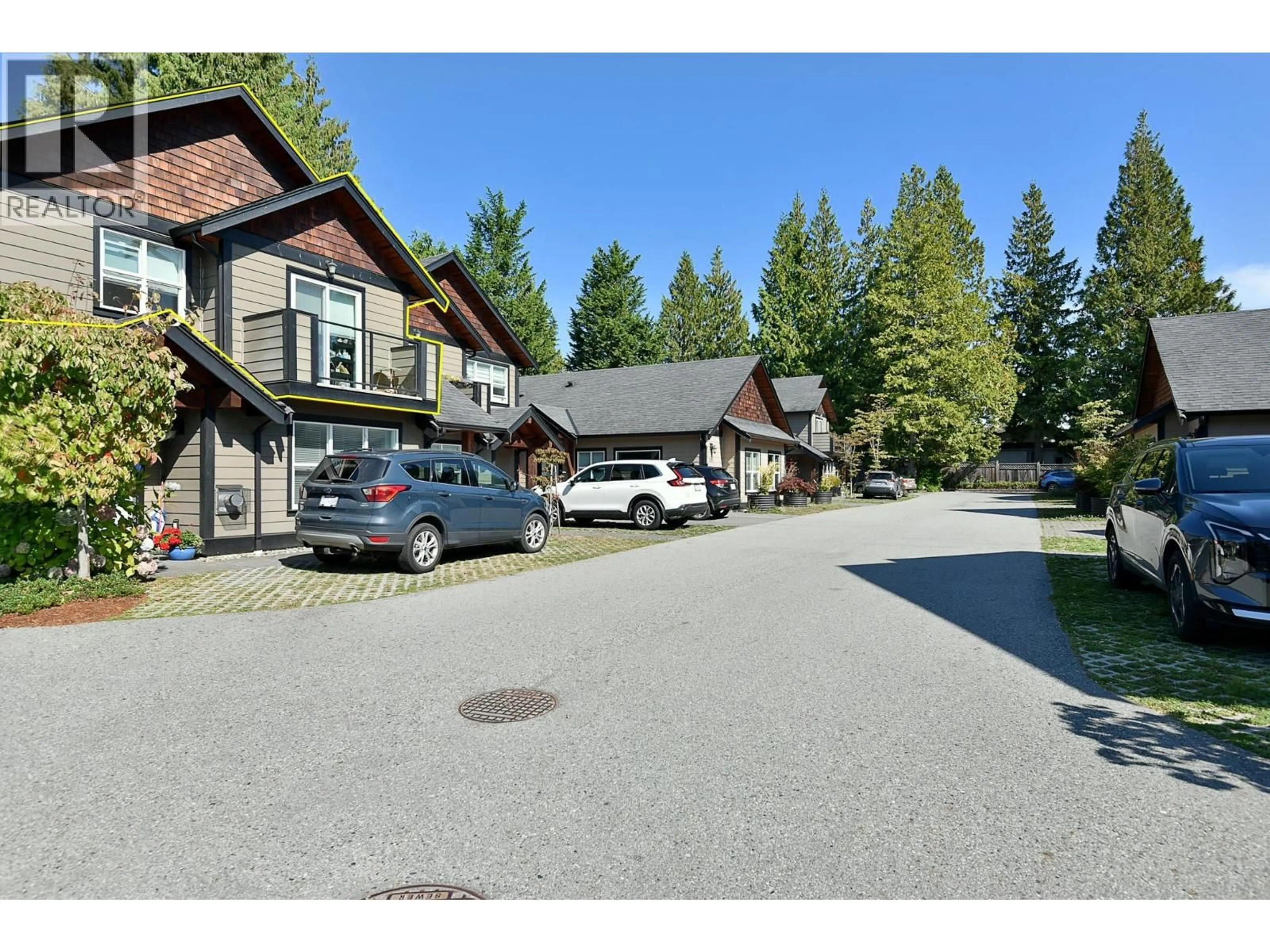 A pic from outside/outdoor area/front of a property/back of a property/a pic from drone, unknown for 208 - 518 SHAW ROAD, Gibsons British Columbia V0N1V8