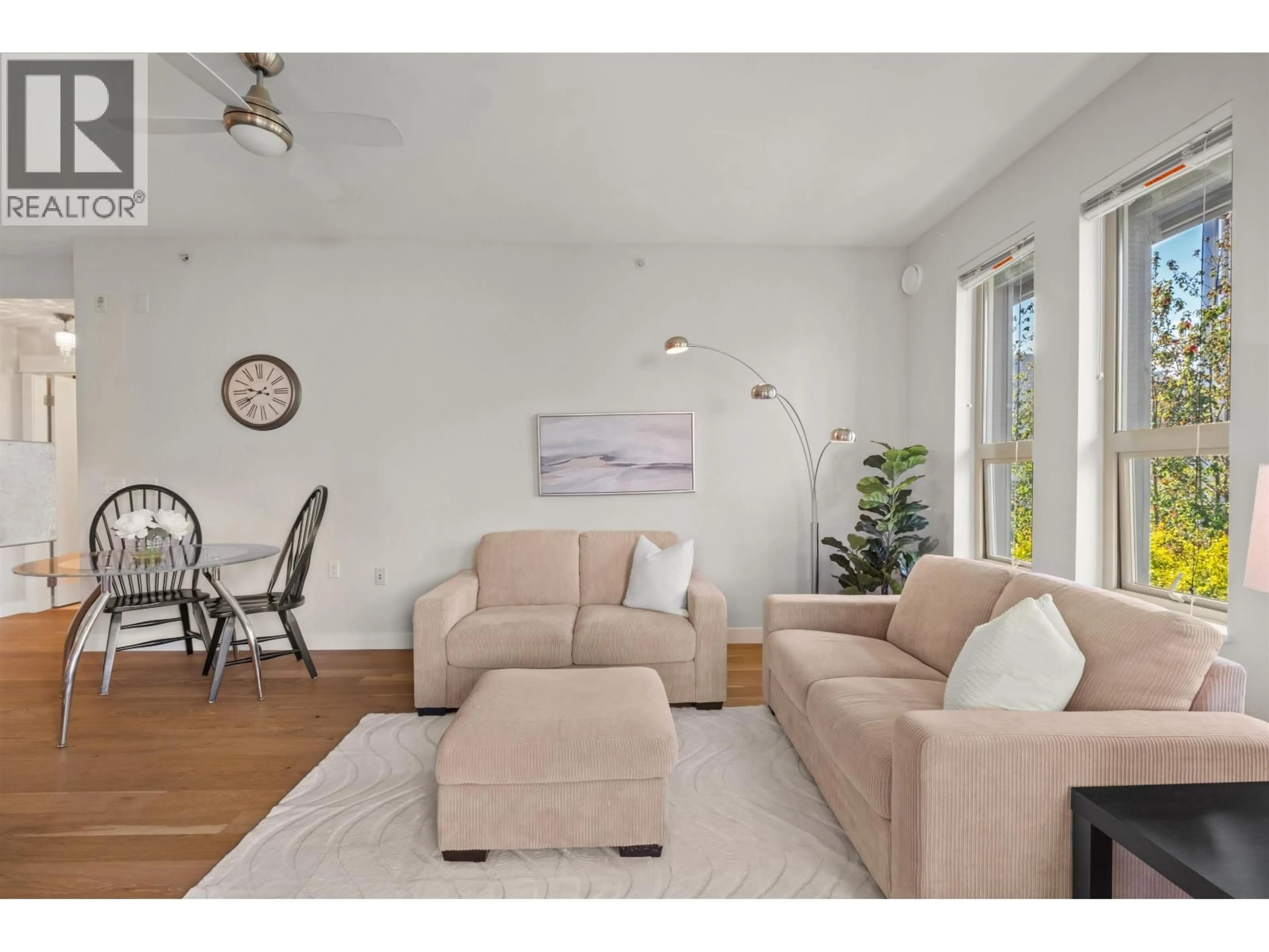 Living room with furniture, wood/laminate floor for 307 - 1468 ST. ANDREWS AVENUE, North Vancouver British Columbia V7L0A8