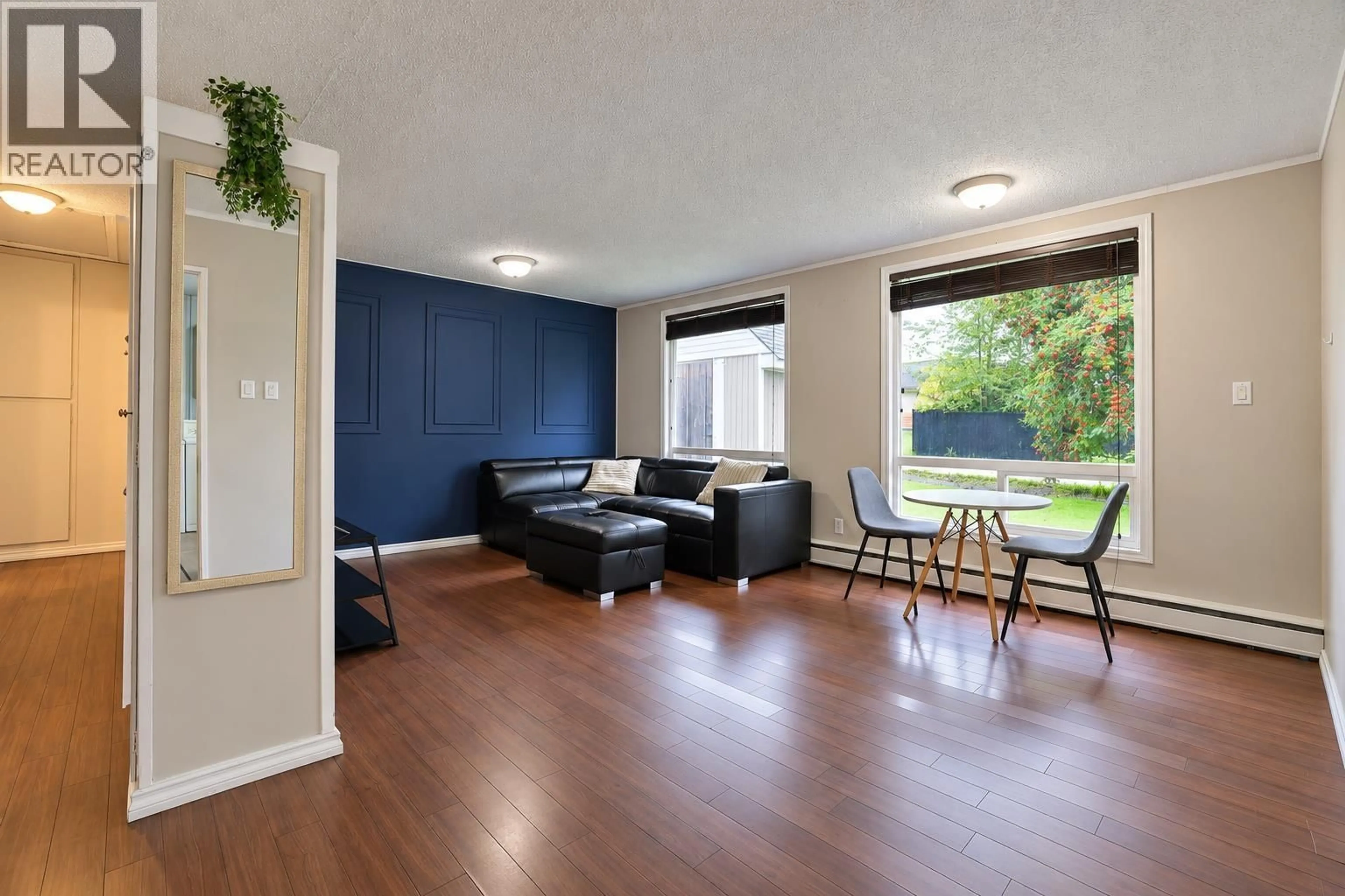 Living room with furniture, wood/laminate floor for 84 CAPILANO STREET, Kitimat British Columbia V8C1X8