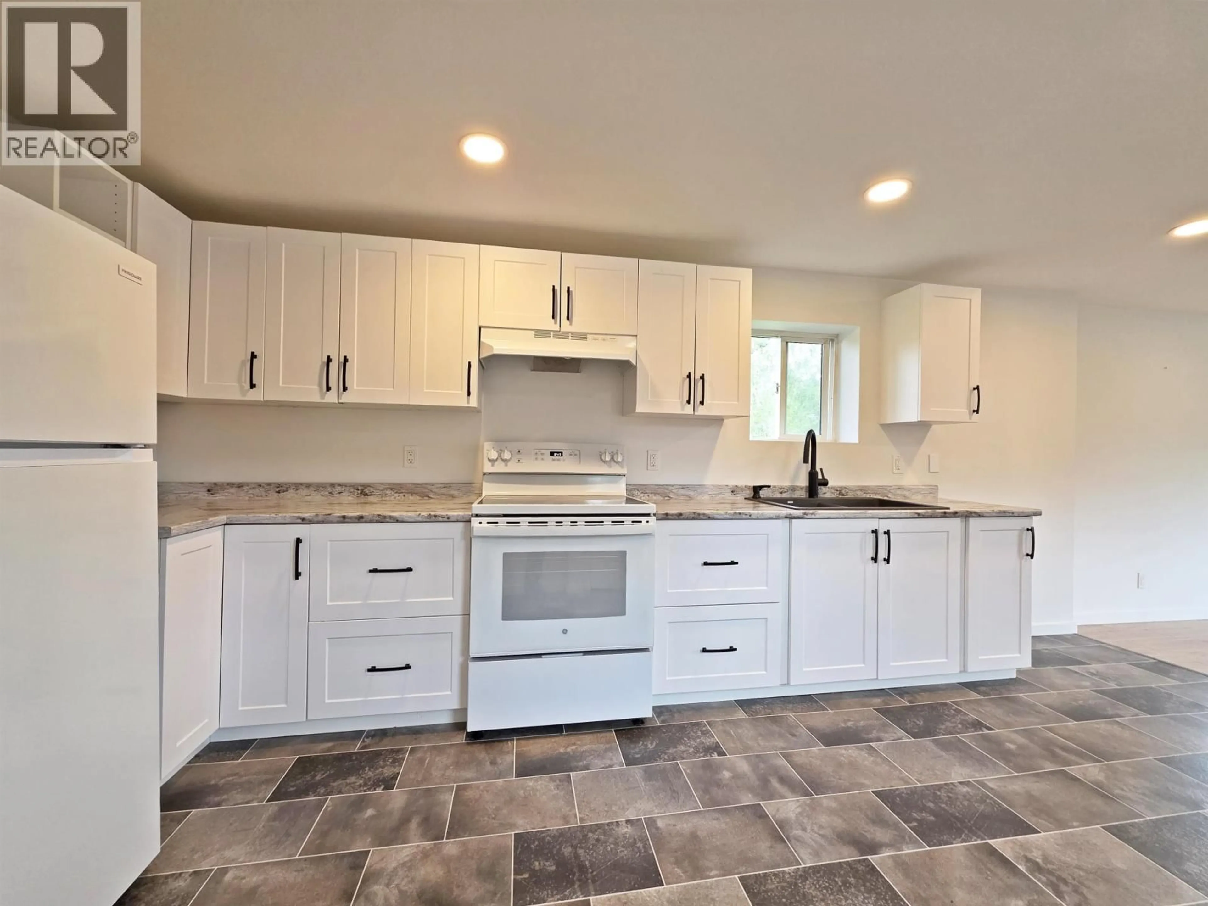 Open concept kitchen, ceramic/tile floor for 1916 BALSAM AVENUE, Quesnel British Columbia V2J3Y9
