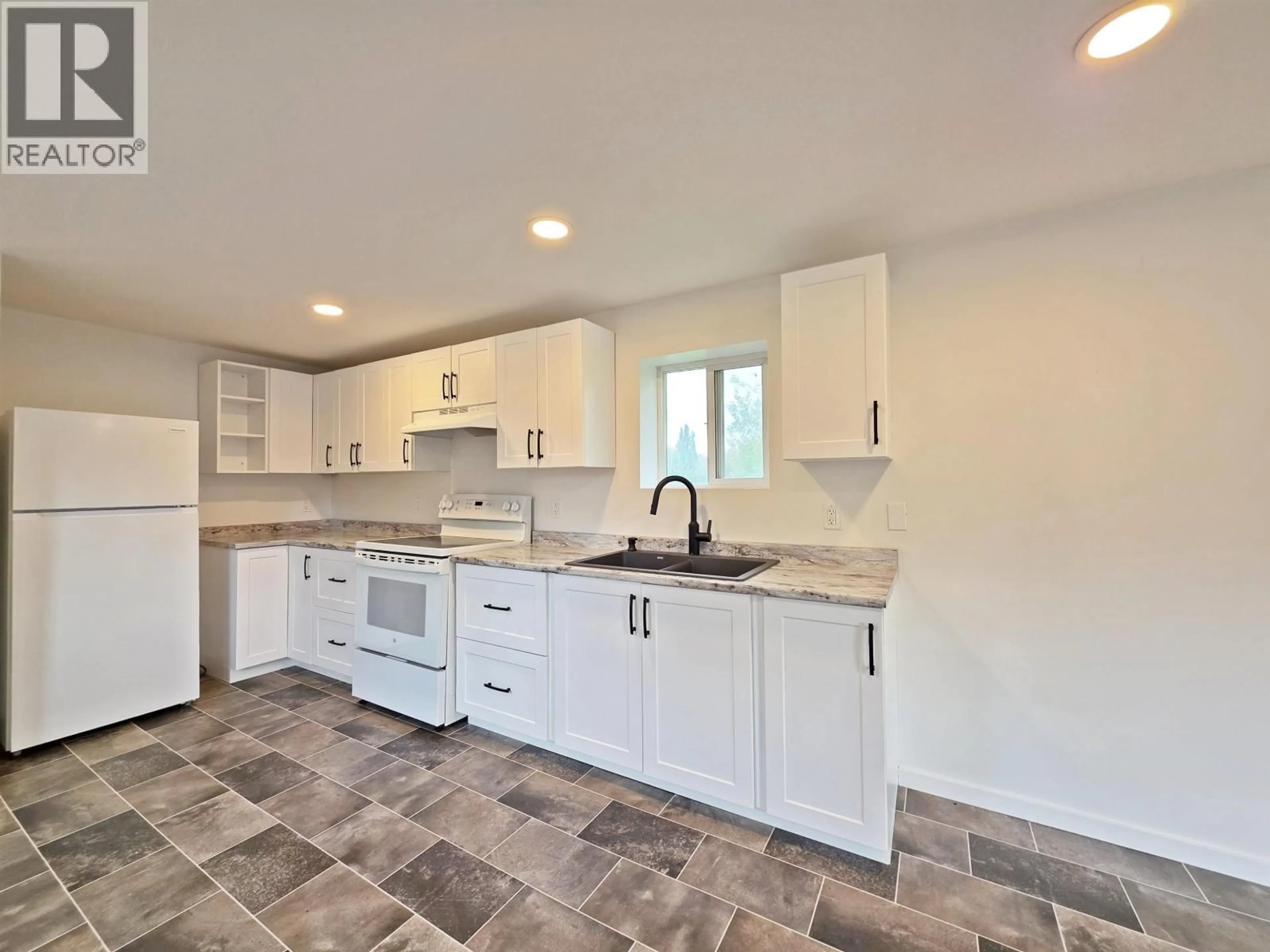 Open concept kitchen, ceramic/tile floor for 1916 BALSAM AVENUE, Quesnel British Columbia V2J3Y9