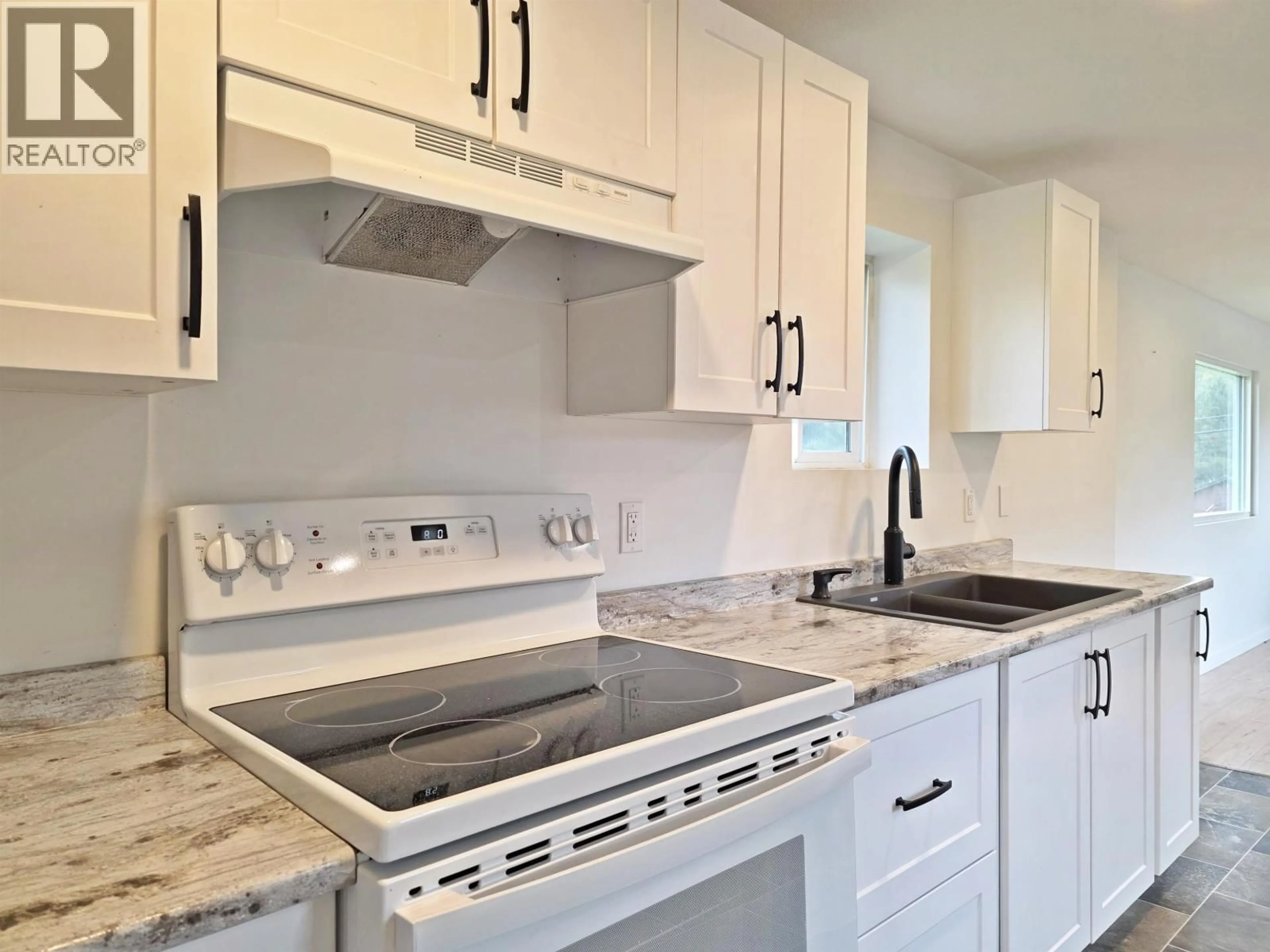 Standard kitchen, ceramic/tile floor for 1916 BALSAM AVENUE, Quesnel British Columbia V2J3Y9