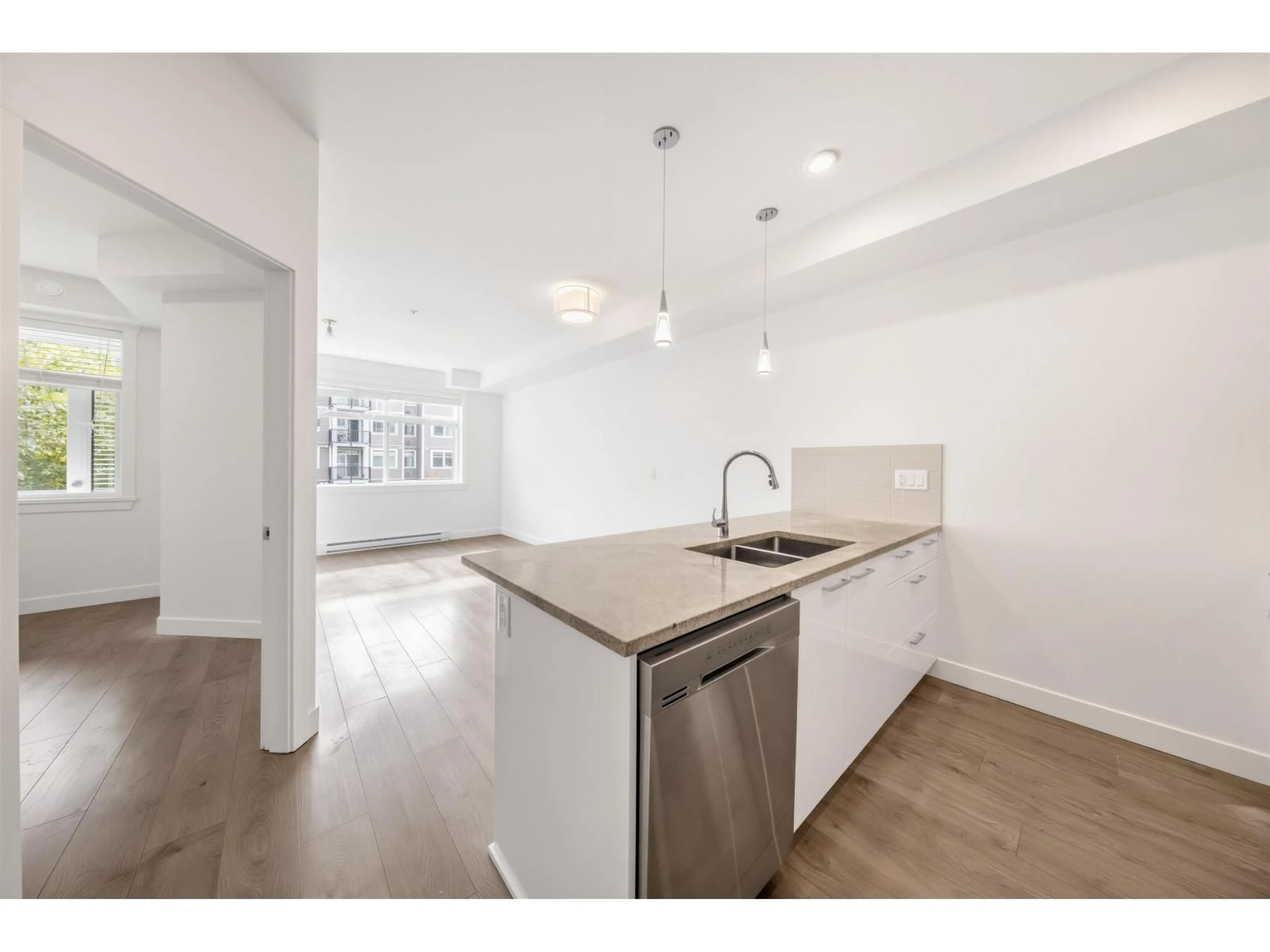 Open concept kitchen, unknown for 209 - 20686 EASTLEIGH CRESCENT, Langley British Columbia V3A0M4