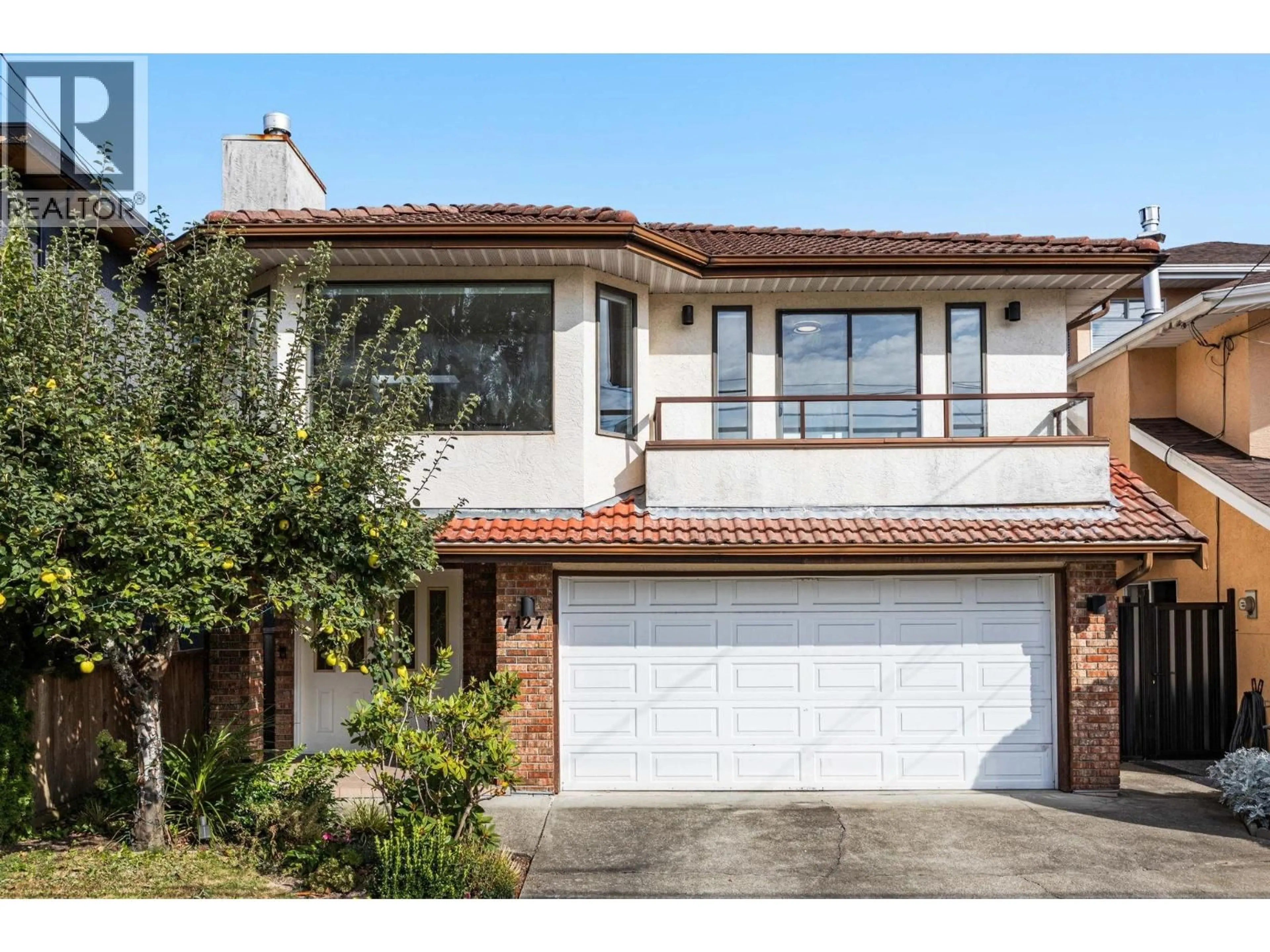 Home with brick exterior material, street for 7127 HALIFAX STREET, Burnaby British Columbia V5A1M1