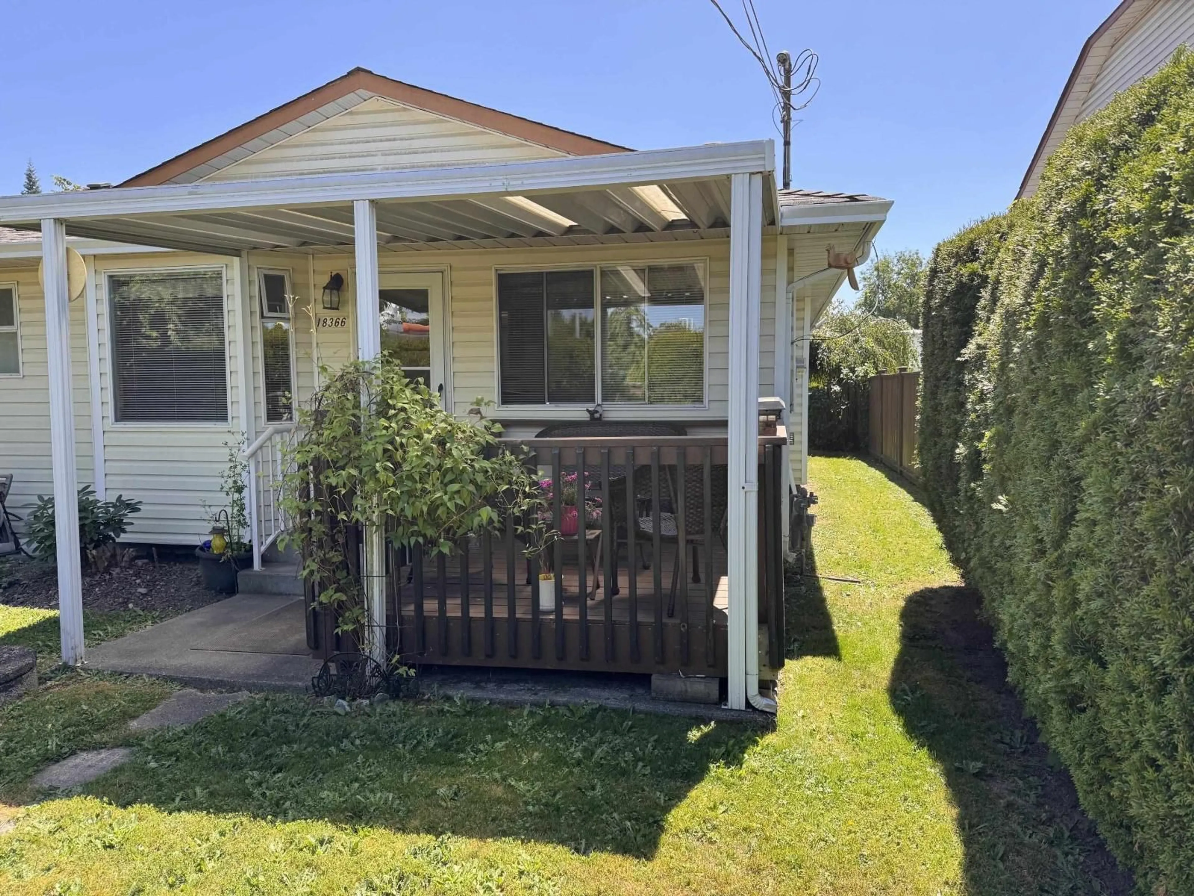 A pic from outside/outdoor area/front of a property/back of a property/a pic from drone, street for 18366 64 AVENUE, Surrey British Columbia V3S8A7