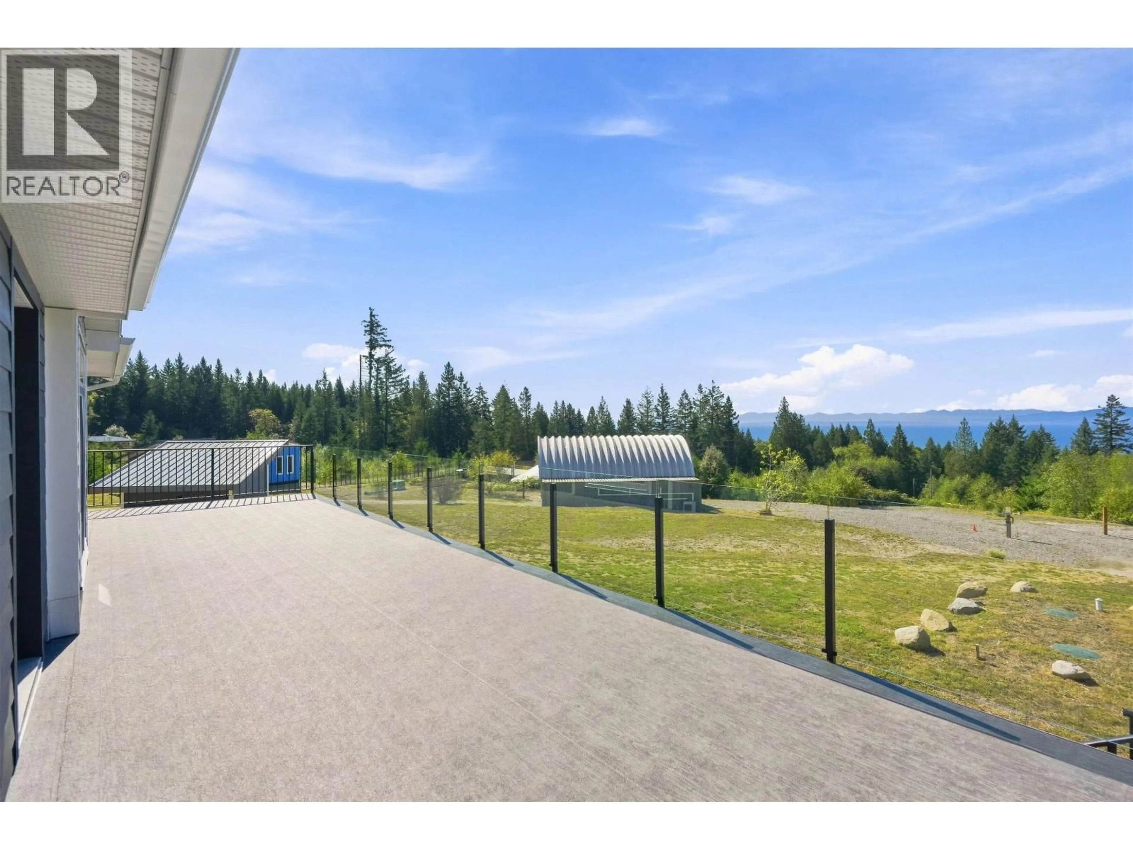 A pic from outside/outdoor area/front of a property/back of a property/a pic from drone, mountain view for 1846 HARMAN ROAD, Roberts Creek British Columbia V0N2W5