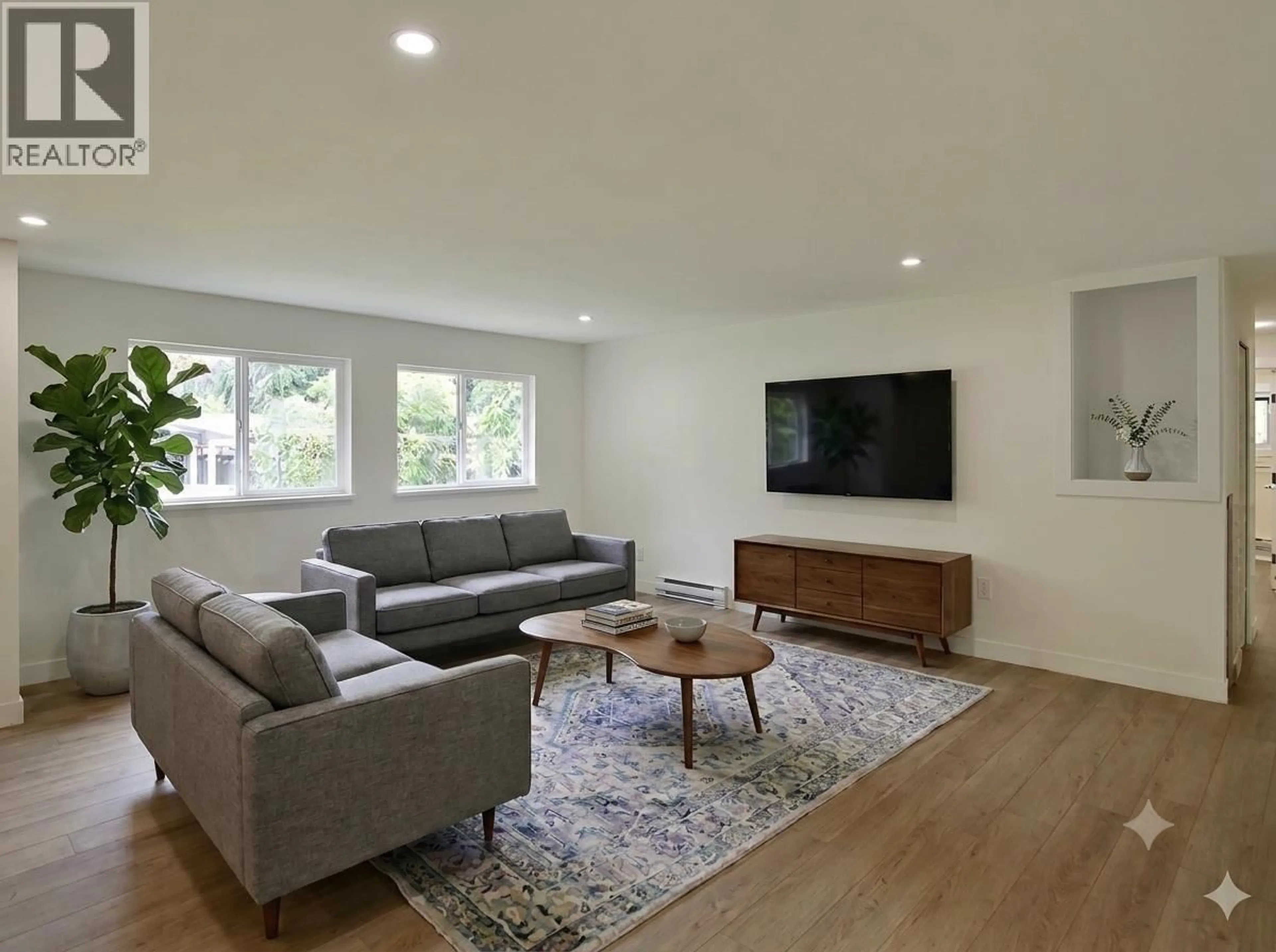 Living room with furniture, wood/laminate floor for 5787 EBBTIDE STREET, Sechelt British Columbia V0N0B7