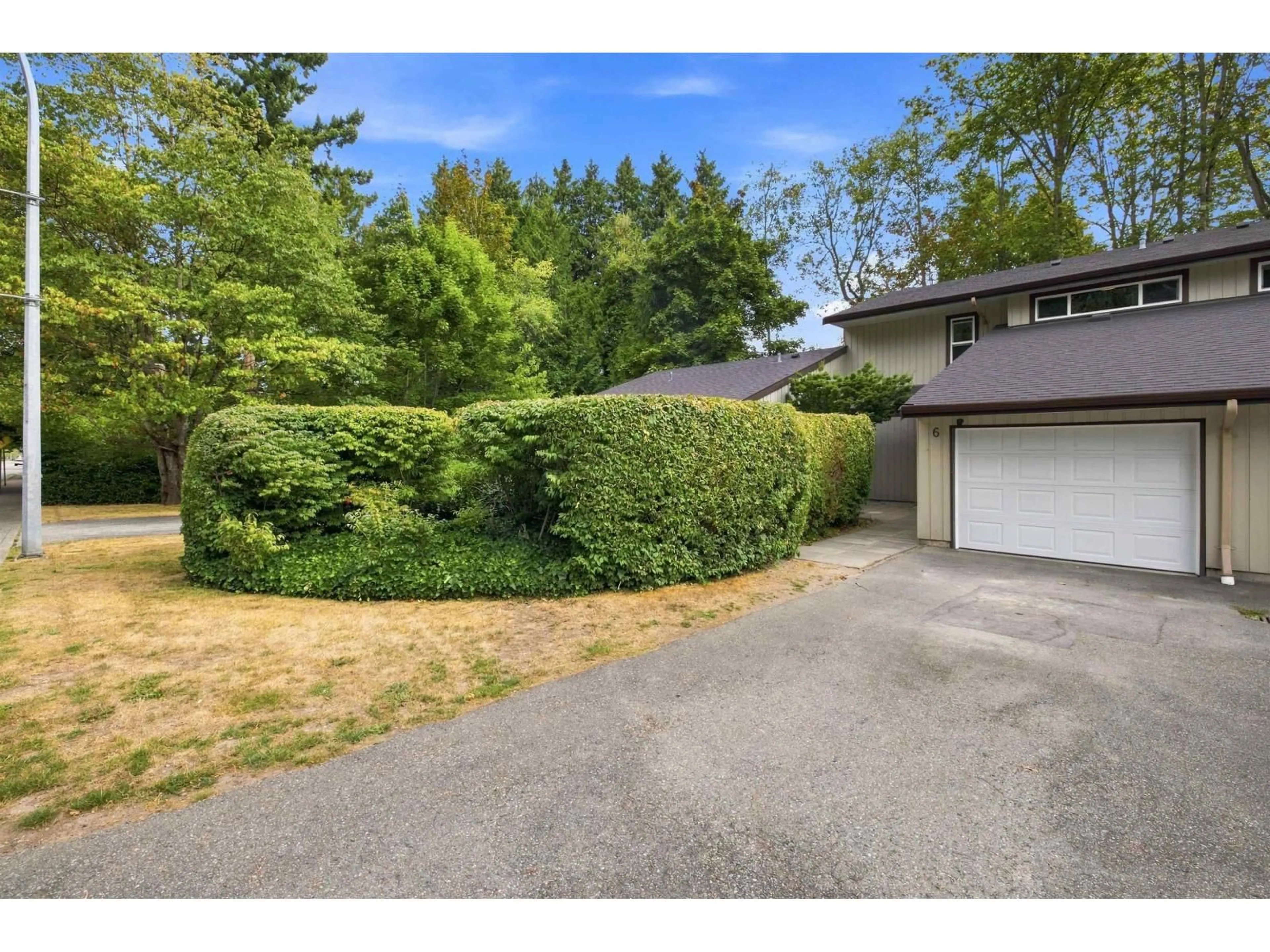 A pic from outside/outdoor area/front of a property/back of a property/a pic from drone, street for 6 - 4860 207 STREET, Langley British Columbia V3A2E3