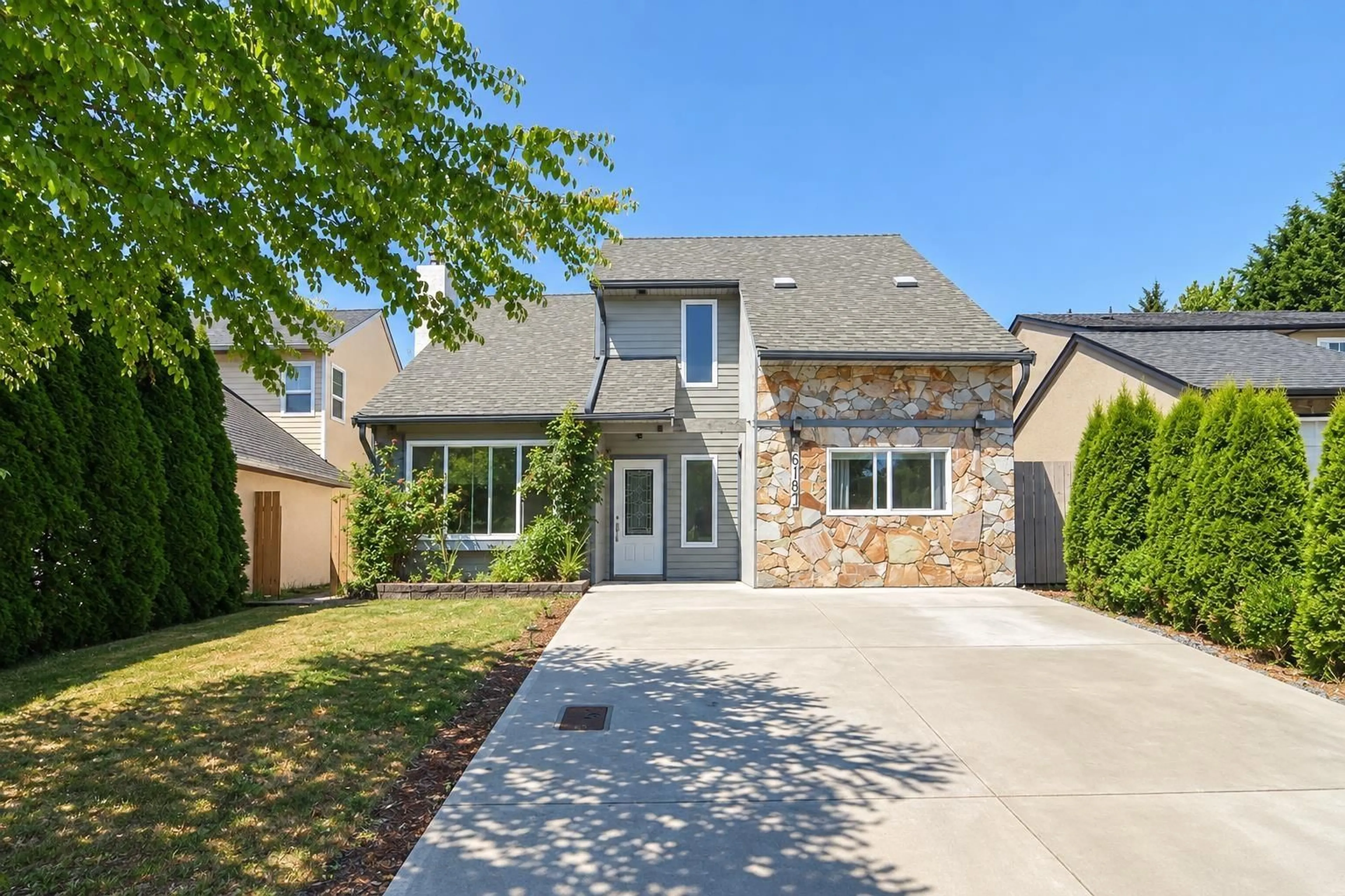 Home with brick exterior material, street for 6187 194 STREET, Surrey British Columbia V3S7L4