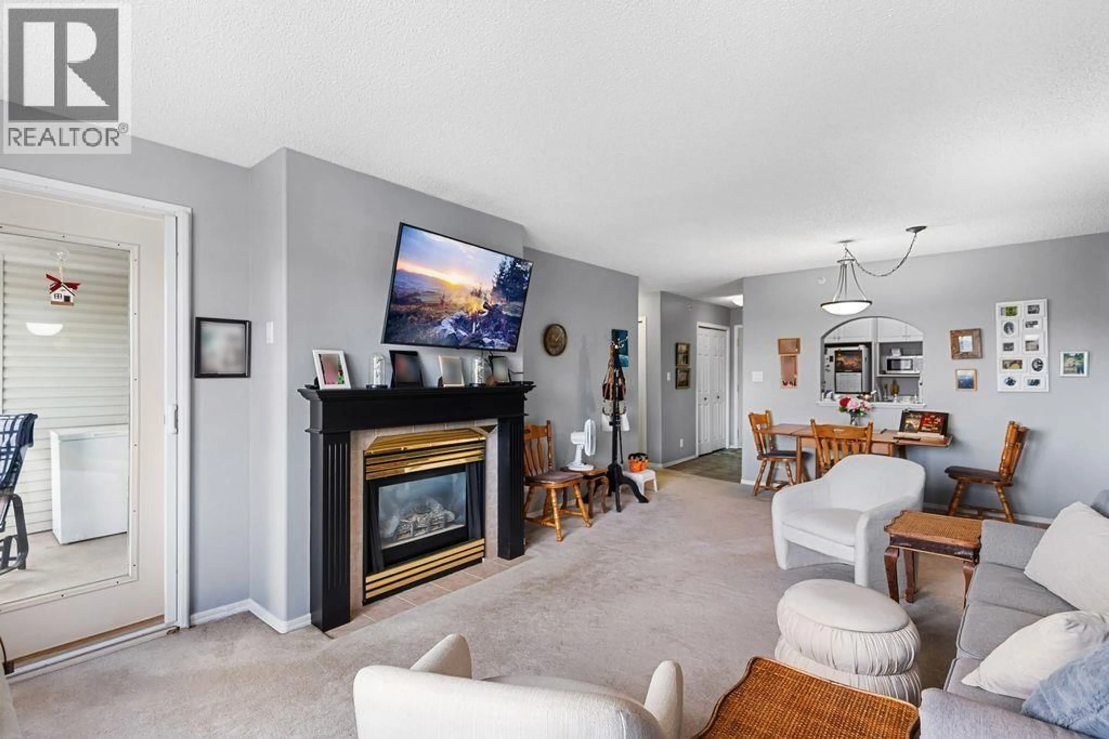 Living room with furniture, unknown for 404 - 1638 6TH AVENUE, Prince George British Columbia V2L3N6