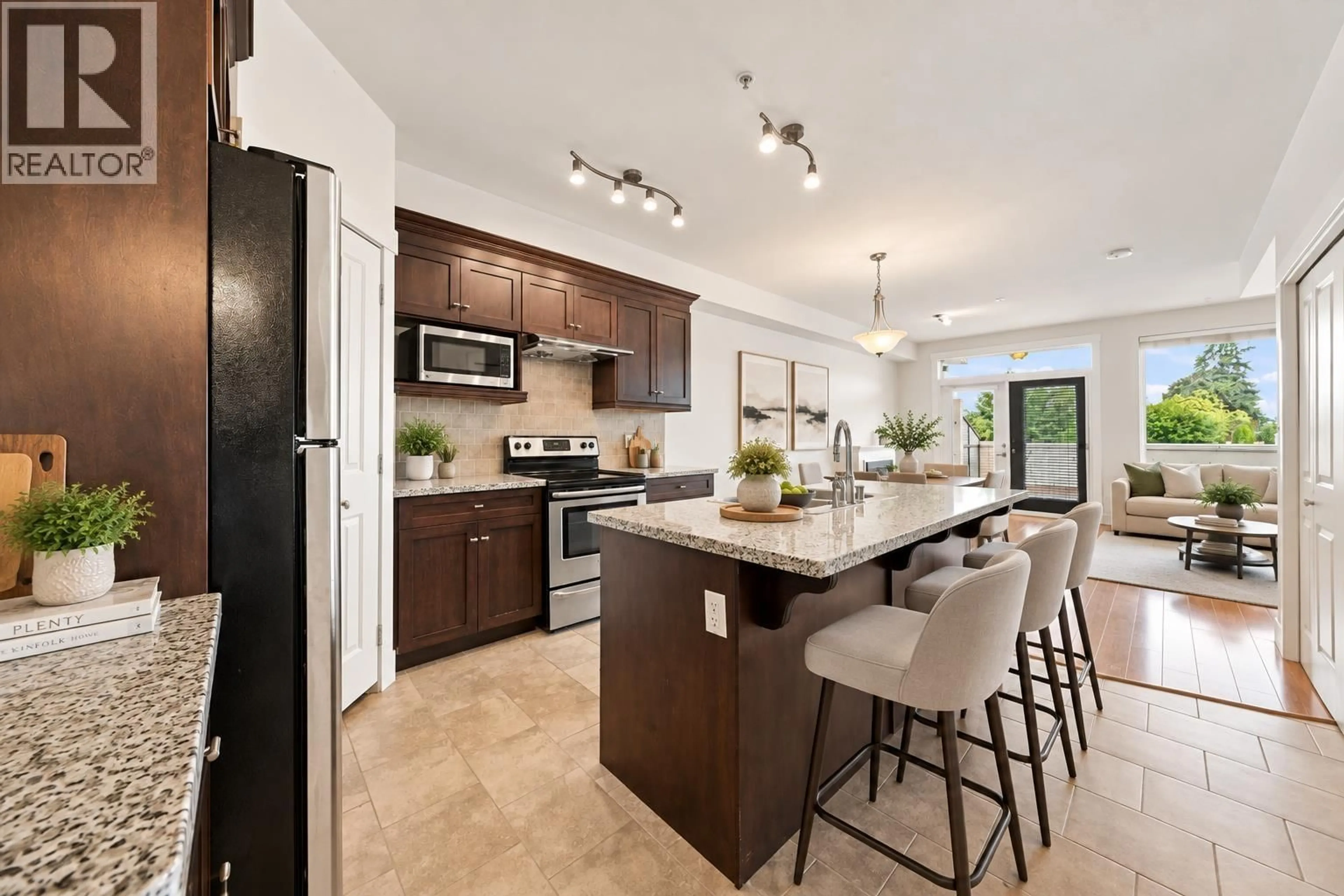 Open concept kitchen, ceramic/tile floor for 205 - 7908 GRAHAM AVENUE, Burnaby British Columbia V3N1V9