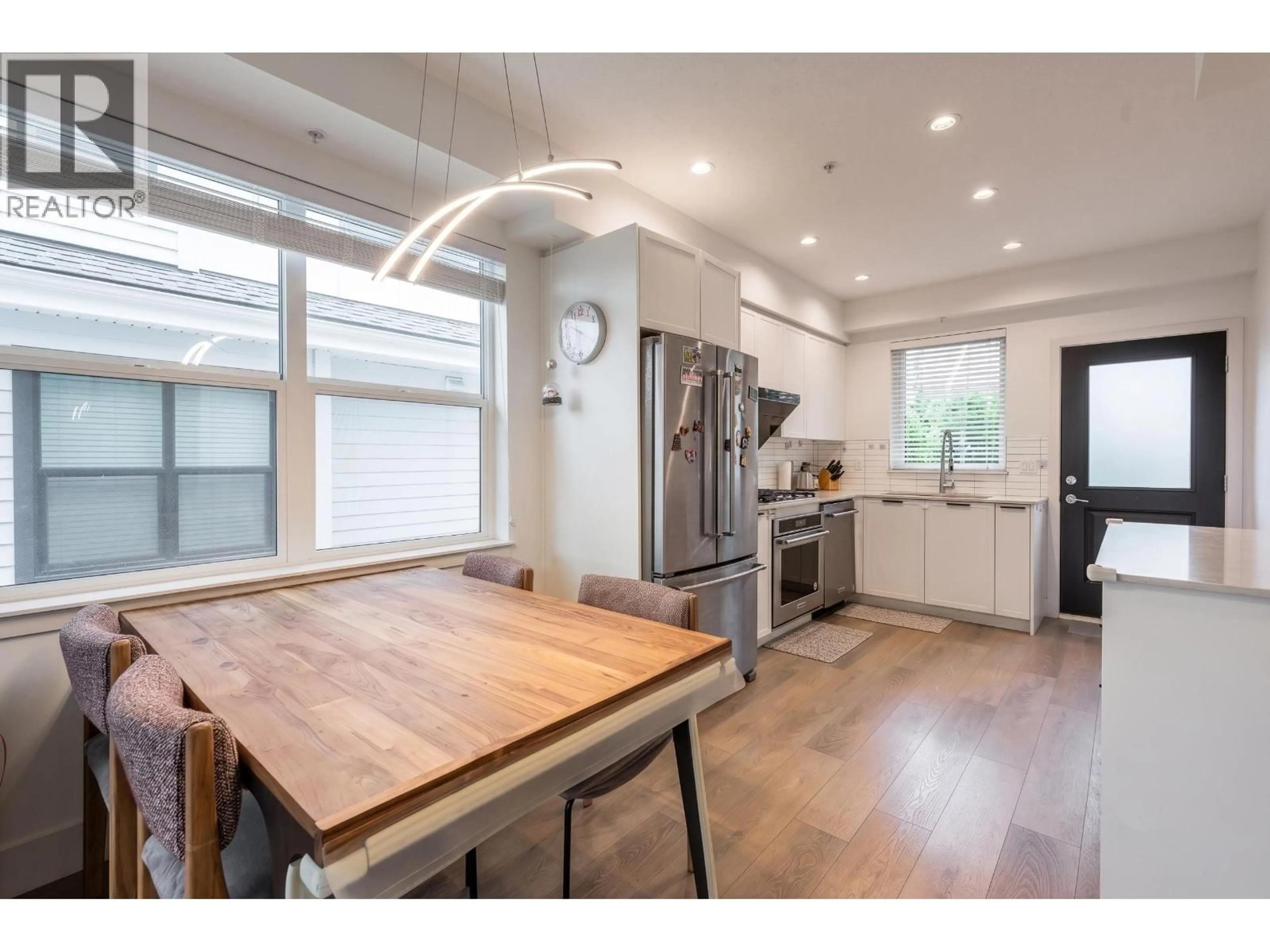 Open concept kitchen, wood/laminate floor for 201 - 6933 ARCOLA STREET, Burnaby British Columbia V5E1H5