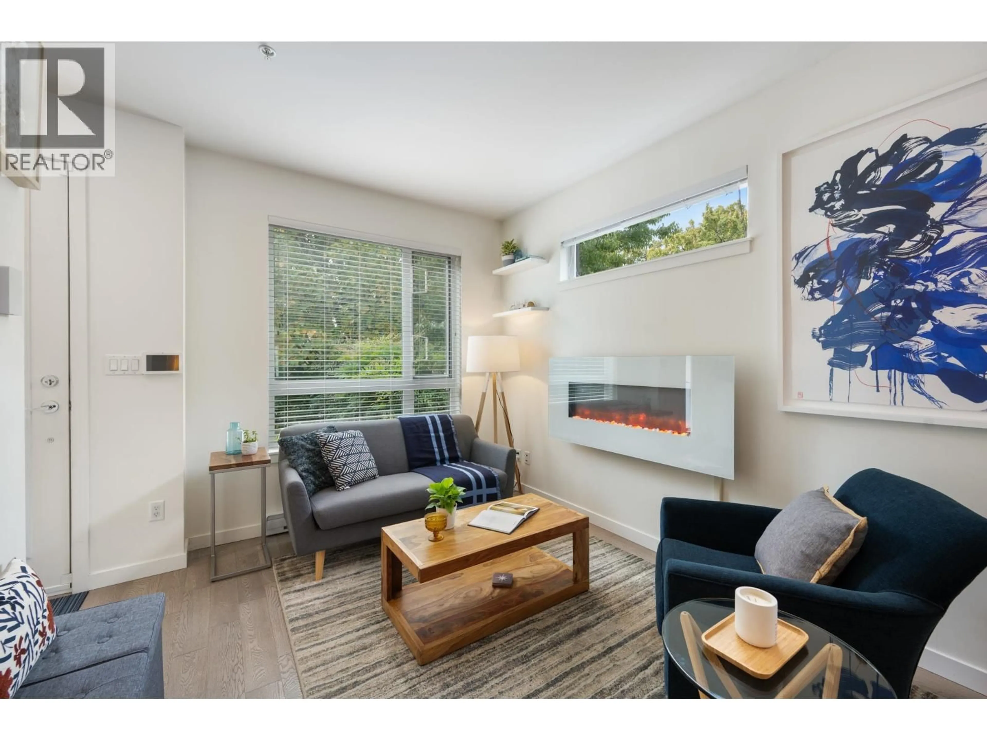 Living room with furniture, wood/laminate floor for 501 44TH AVENUE, Vancouver British Columbia V5W0C5