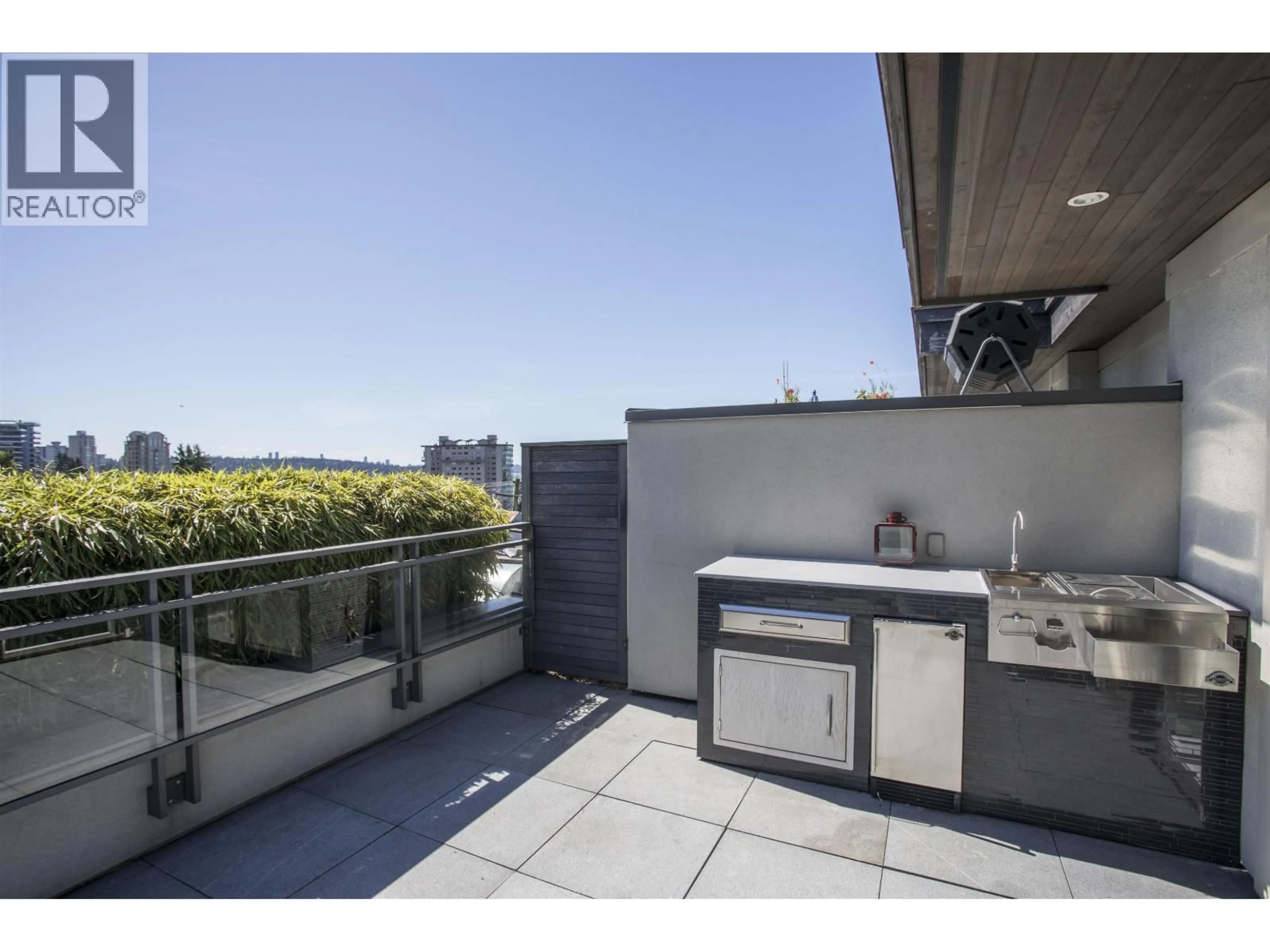 Patio, city buildings view from balcony for 300 - 2432 HAYWOOD AVENUE, West Vancouver British Columbia V7V1Y1