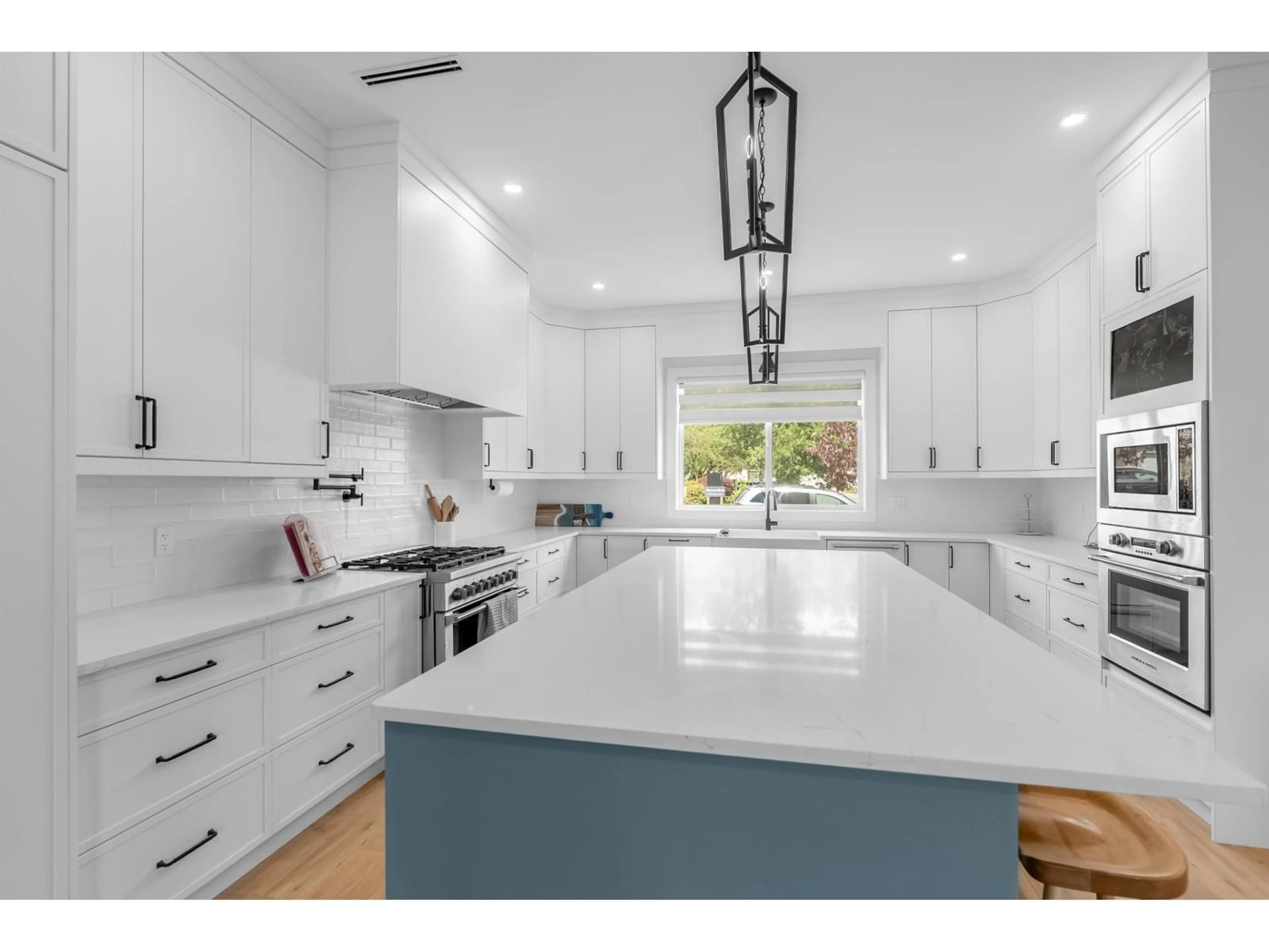 Open concept kitchen, ceramic/tile floor for 8910 117A STREET, Delta British Columbia V4C6C8