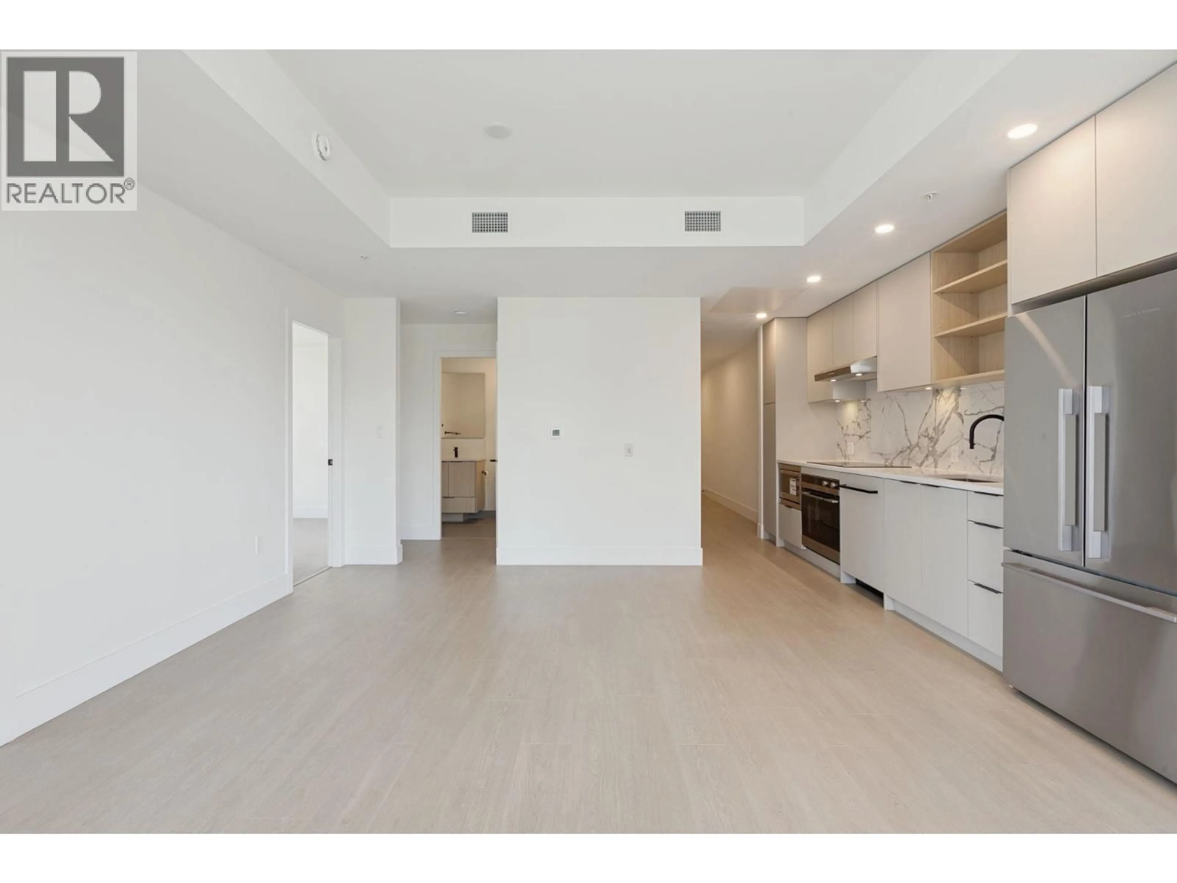Open concept kitchen, unknown for 303 - 333 ST. DAVIDS AVENUE, North Vancouver British Columbia V7L3N7