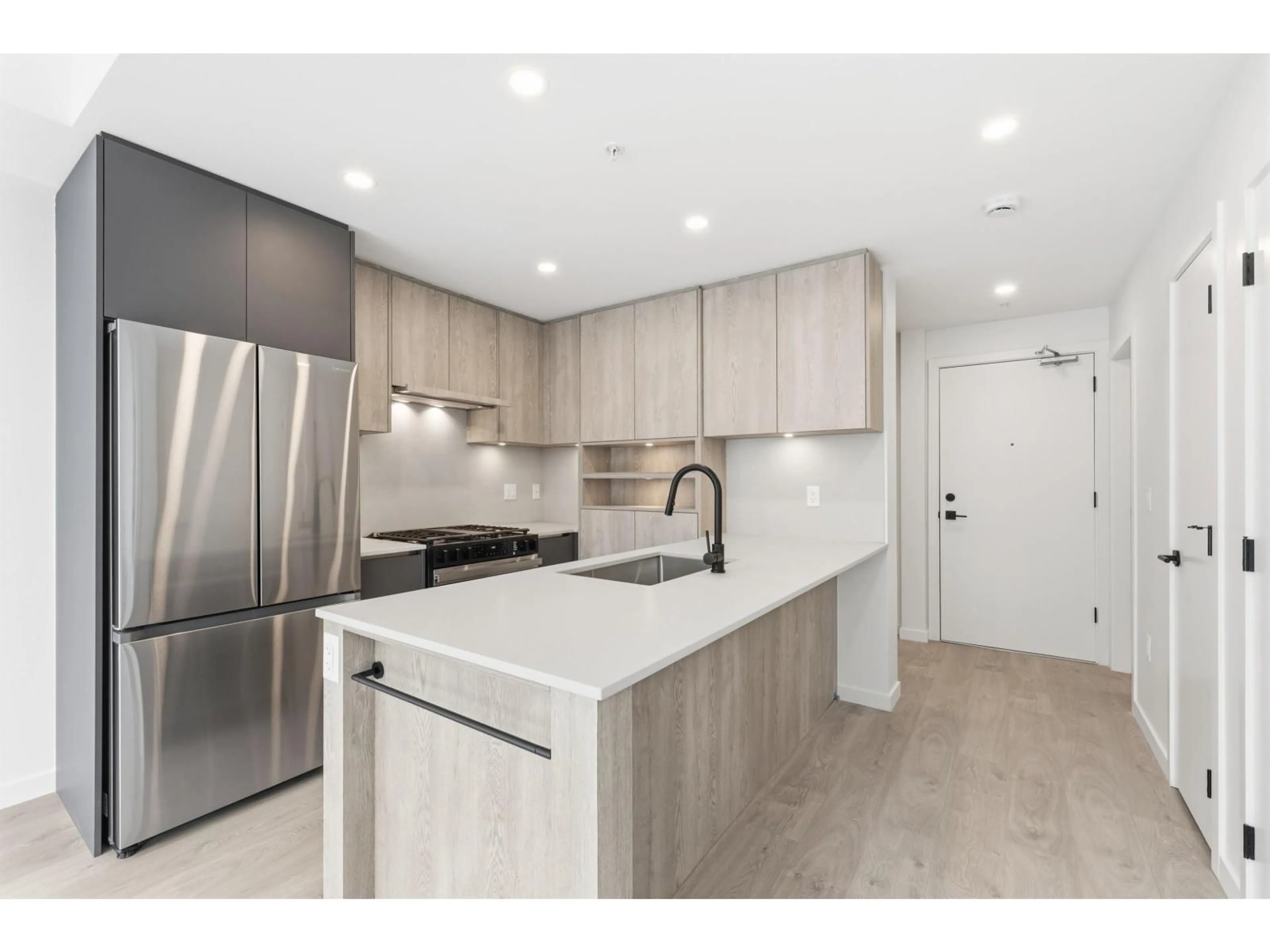 Open concept kitchen, unknown for 505 - 19577 65B AVENUE, Surrey British Columbia V4N6B5