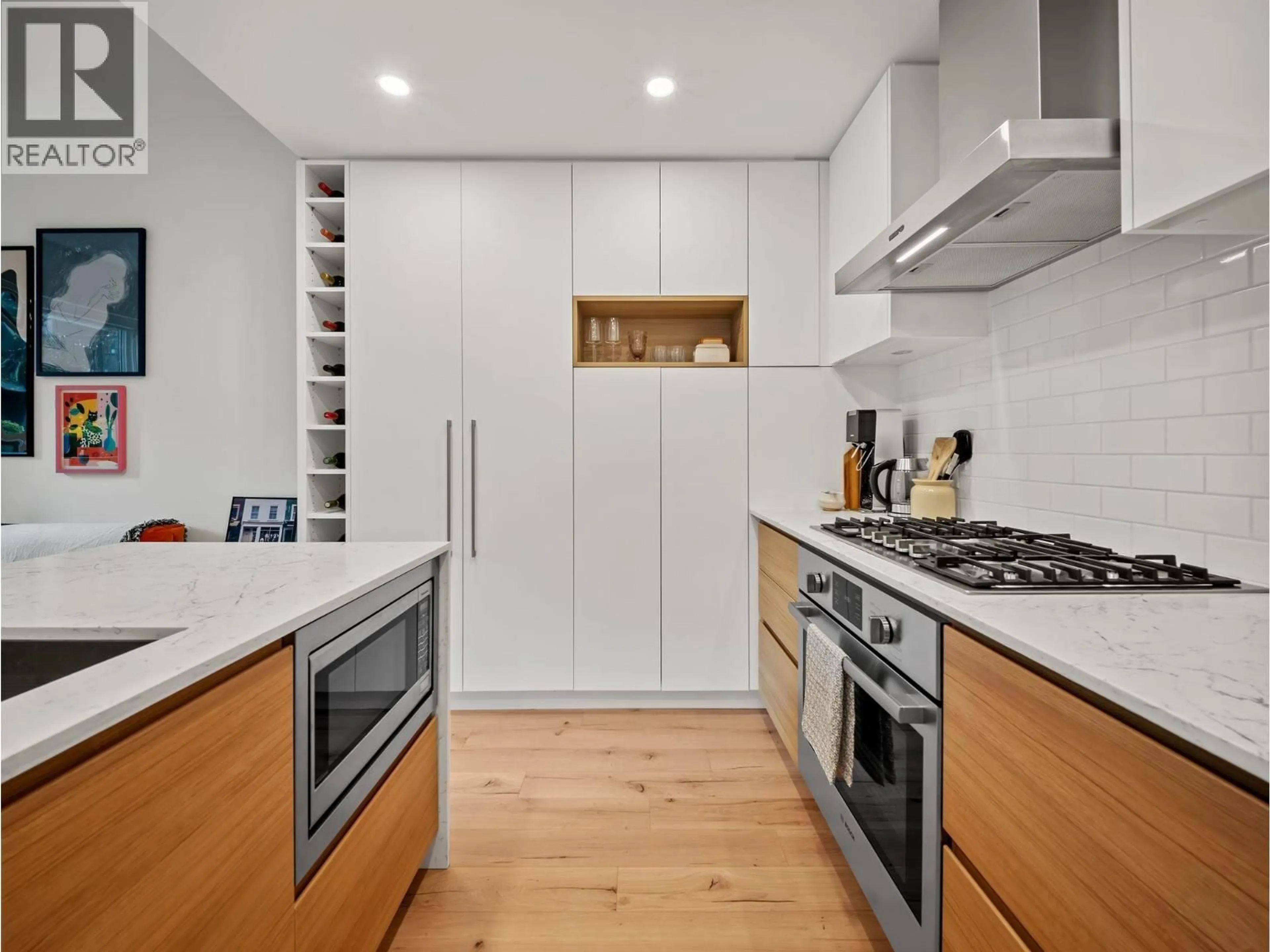 Contemporary kitchen, wood/laminate floor for 107 - 55 KLAHANIE DRIVE, Port Moody British Columbia V3H0M9