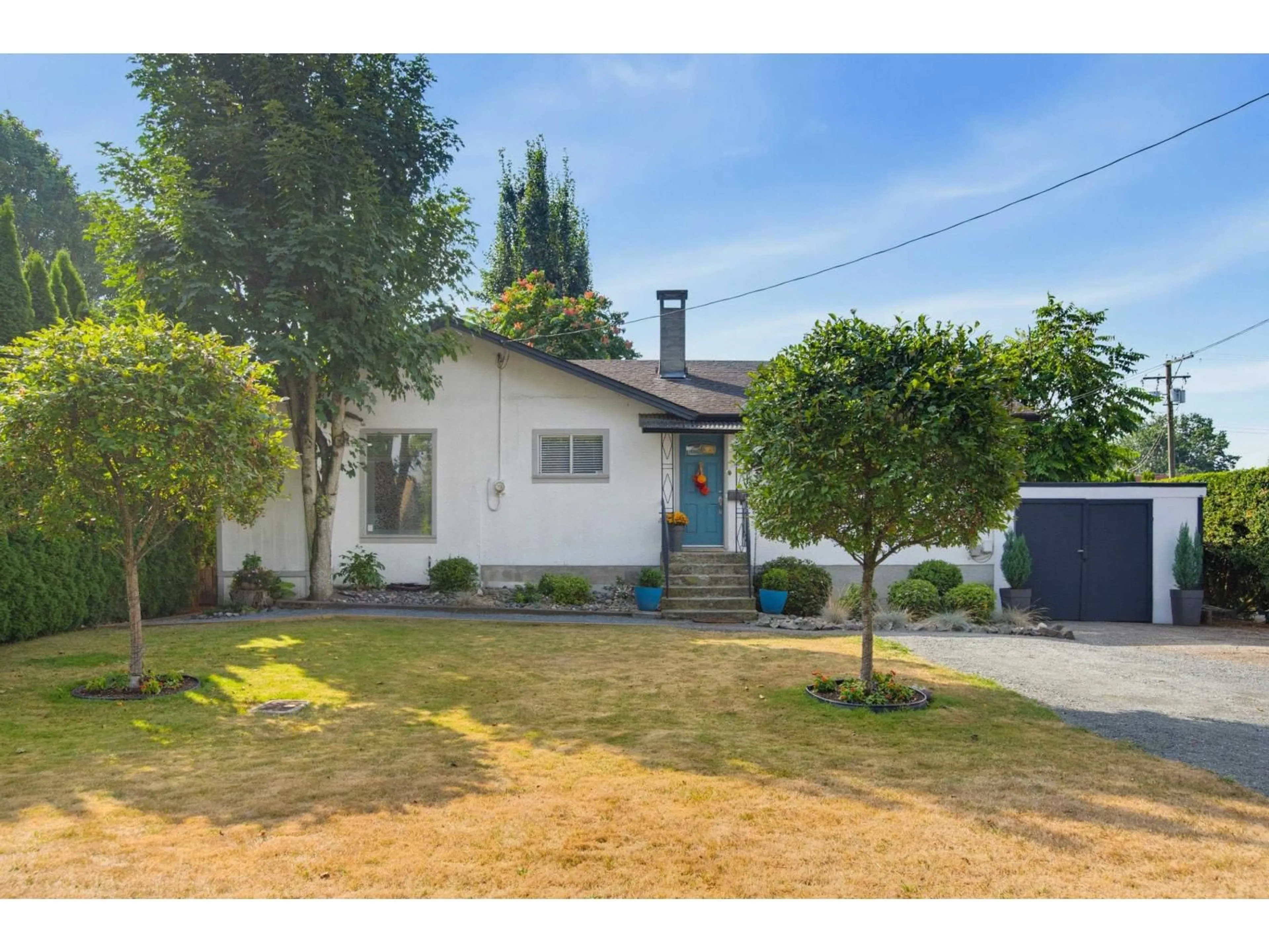 A pic from outside/outdoor area/front of a property/back of a property/a pic from drone, street for 46156 THIRD AVENUE, Chilliwack British Columbia V2P1R6