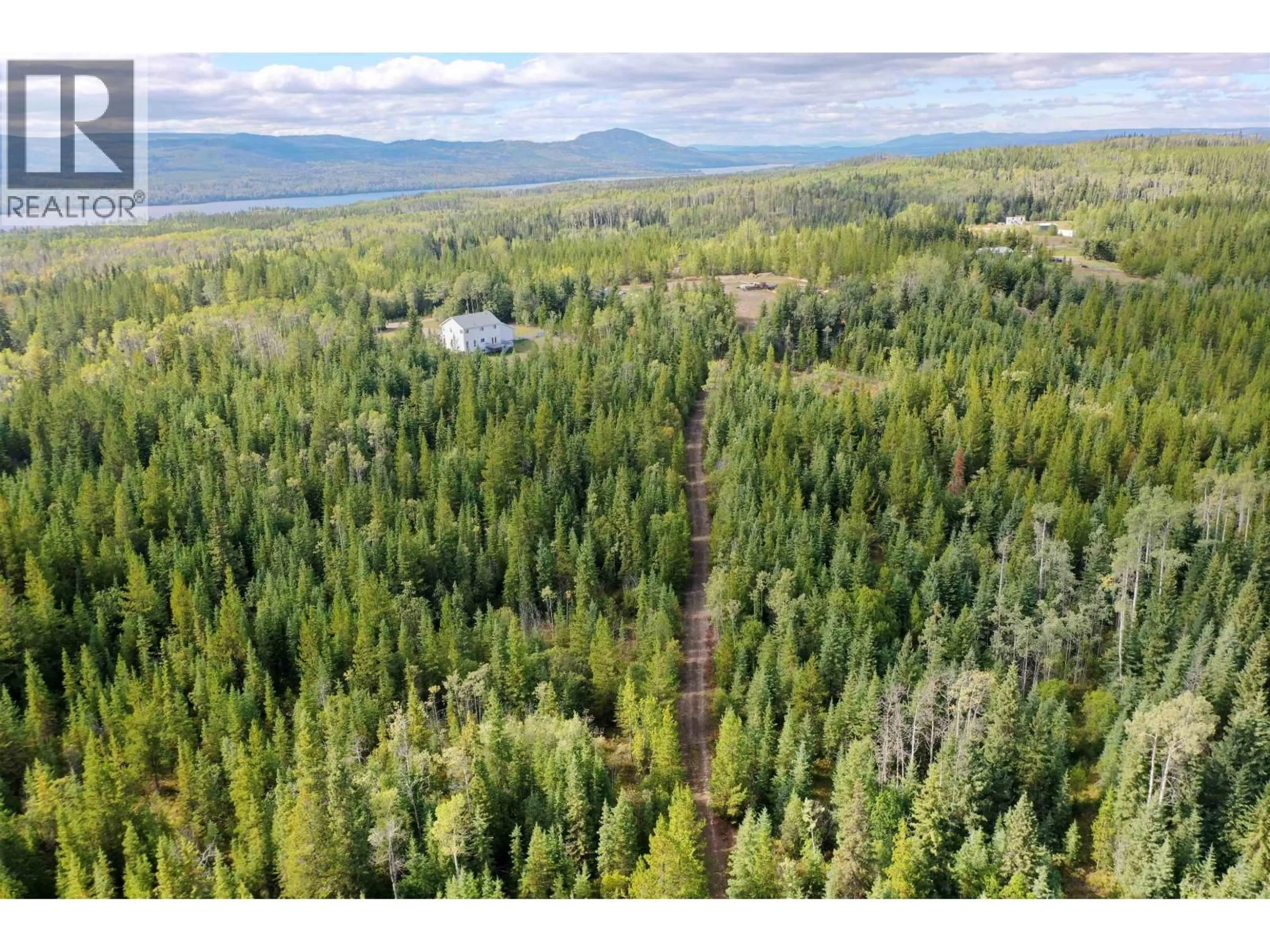 A pic from outside/outdoor area/front of a property/back of a property/a pic from drone, forest/trees view for 3270 WALLACE ROAD, Burns Lake British Columbia V0J1E1