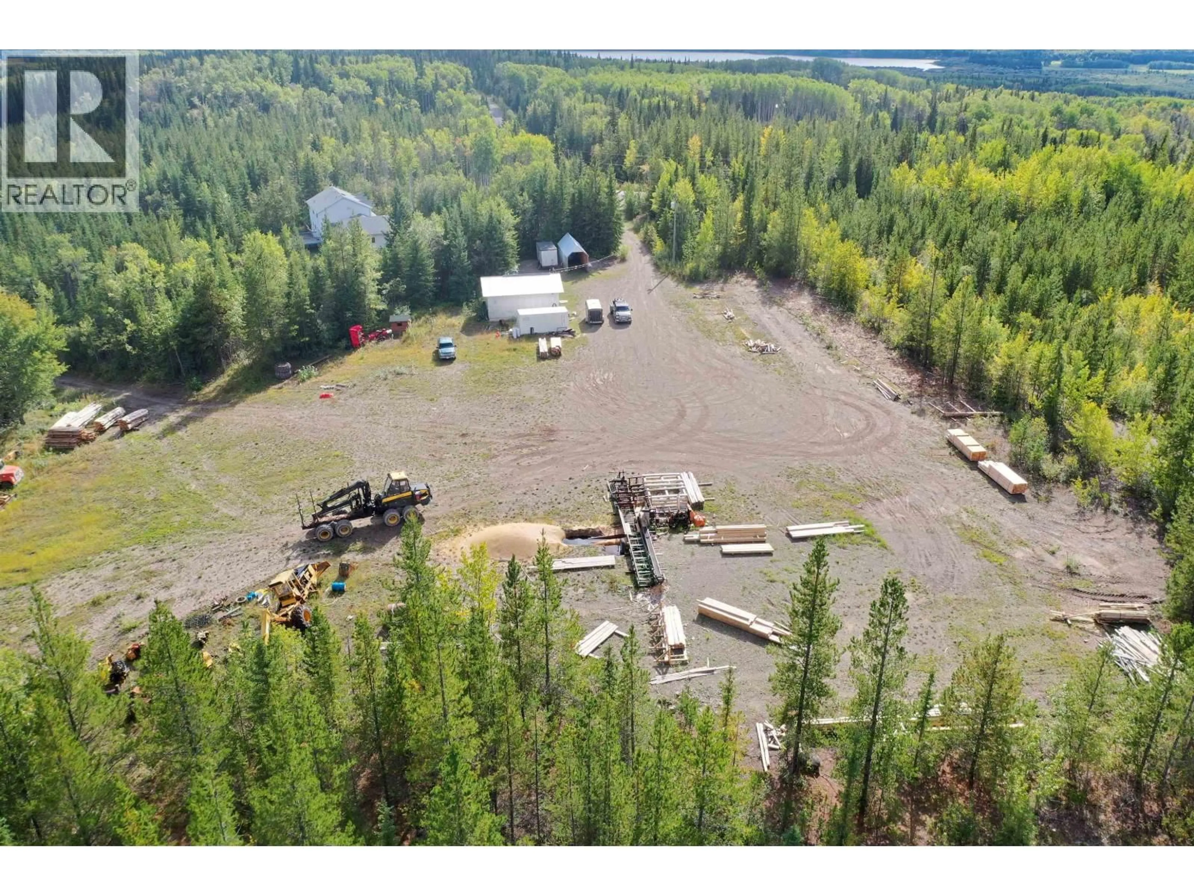 A pic from outside/outdoor area/front of a property/back of a property/a pic from drone, forest/trees view for 3270 WALLACE ROAD, Burns Lake British Columbia V0J1E1