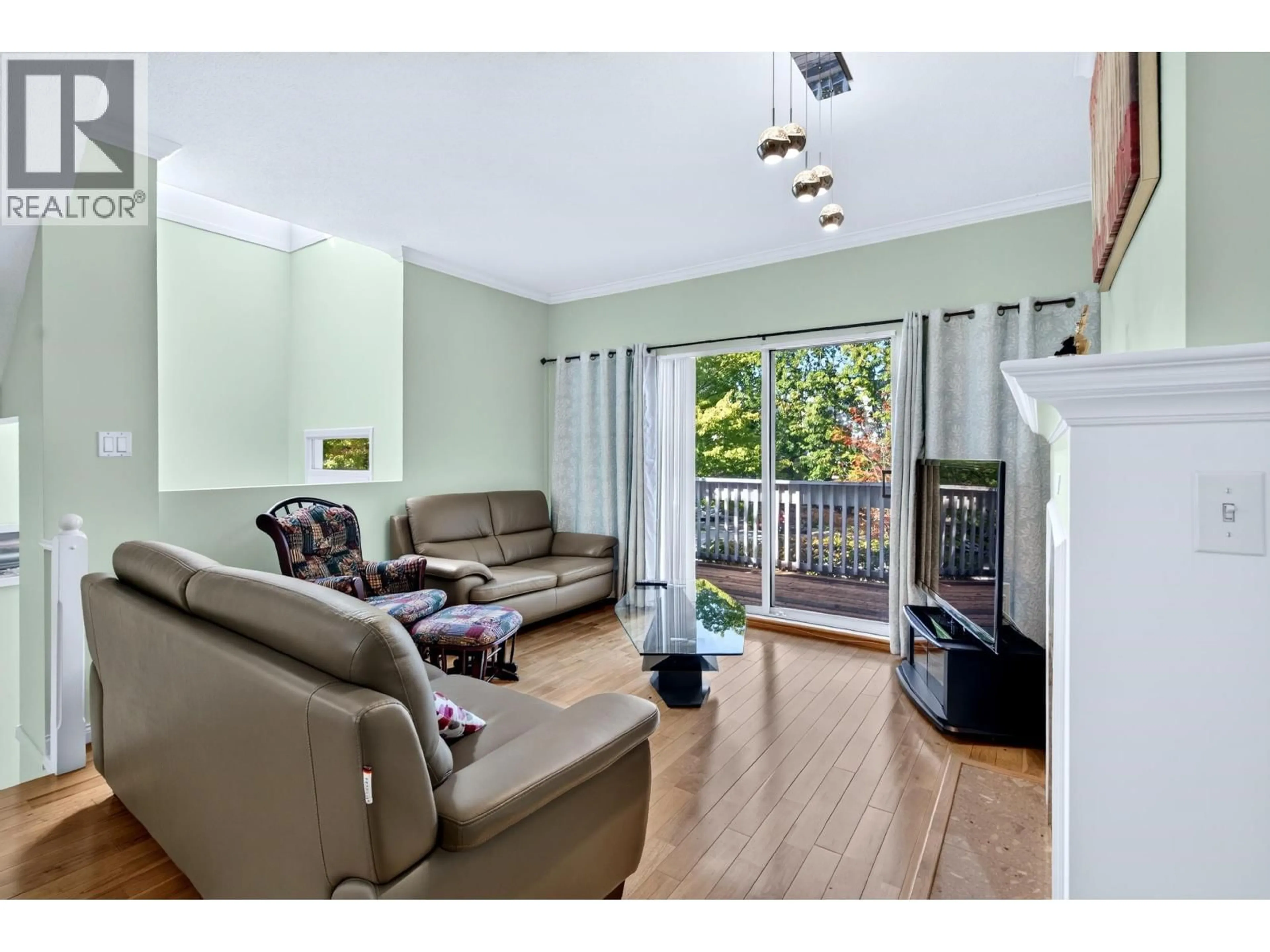 Living room with furniture, wood/laminate floor for 94 - 12500 MCNEELY DRIVE, Richmond British Columbia V6V2S4