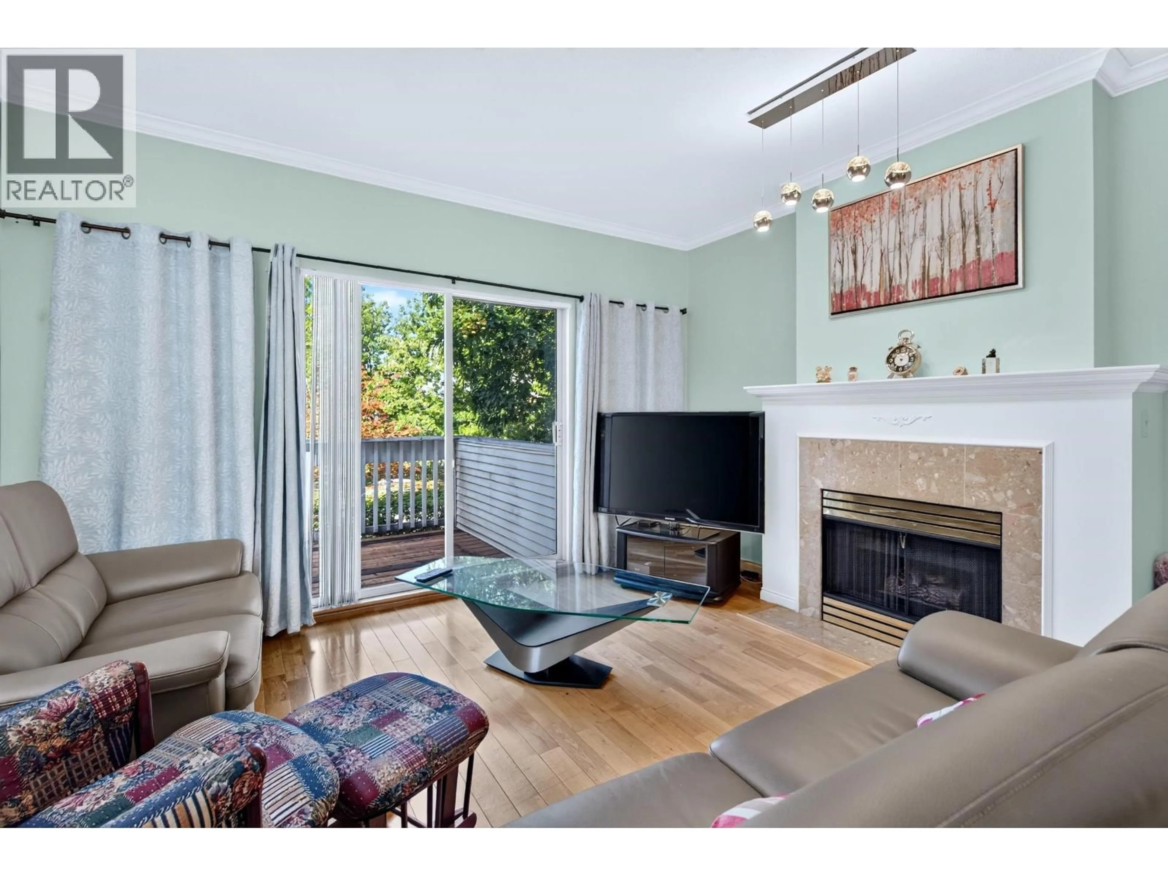 Living room with furniture, wood/laminate floor for 94 - 12500 MCNEELY DRIVE, Richmond British Columbia V6V2S4