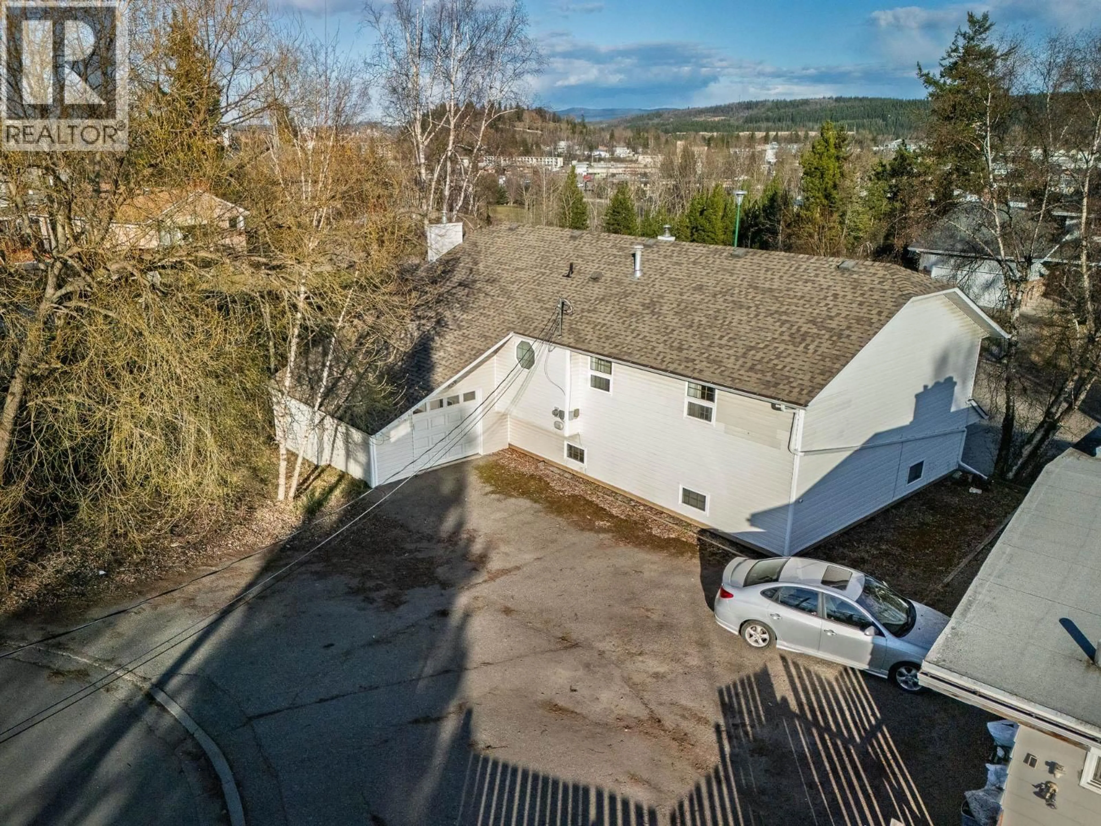 A pic from outside/outdoor area/front of a property/back of a property/a pic from drone, mountain view for 1585 EDMONTON STREET, Prince George British Columbia V2M1X5