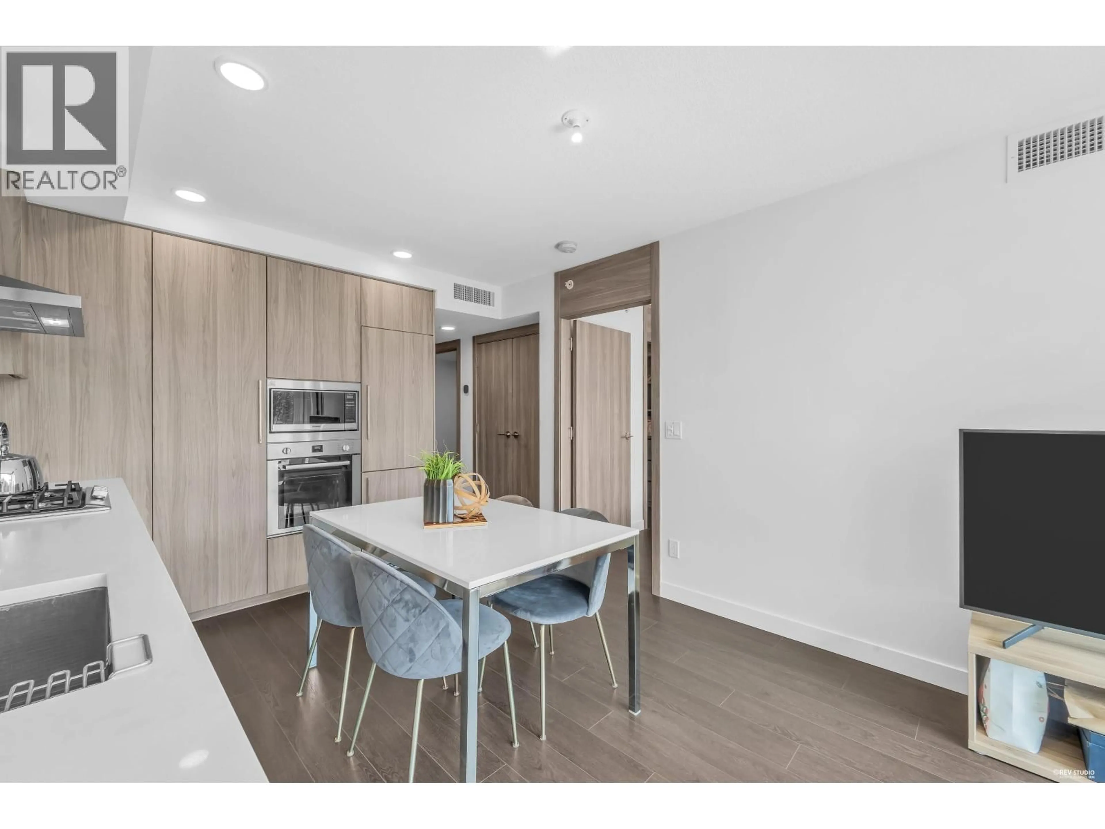Open concept kitchen, unknown for 617 - 8800 HAZELBRIDGE WAY, Richmond British Columbia V6X0S3