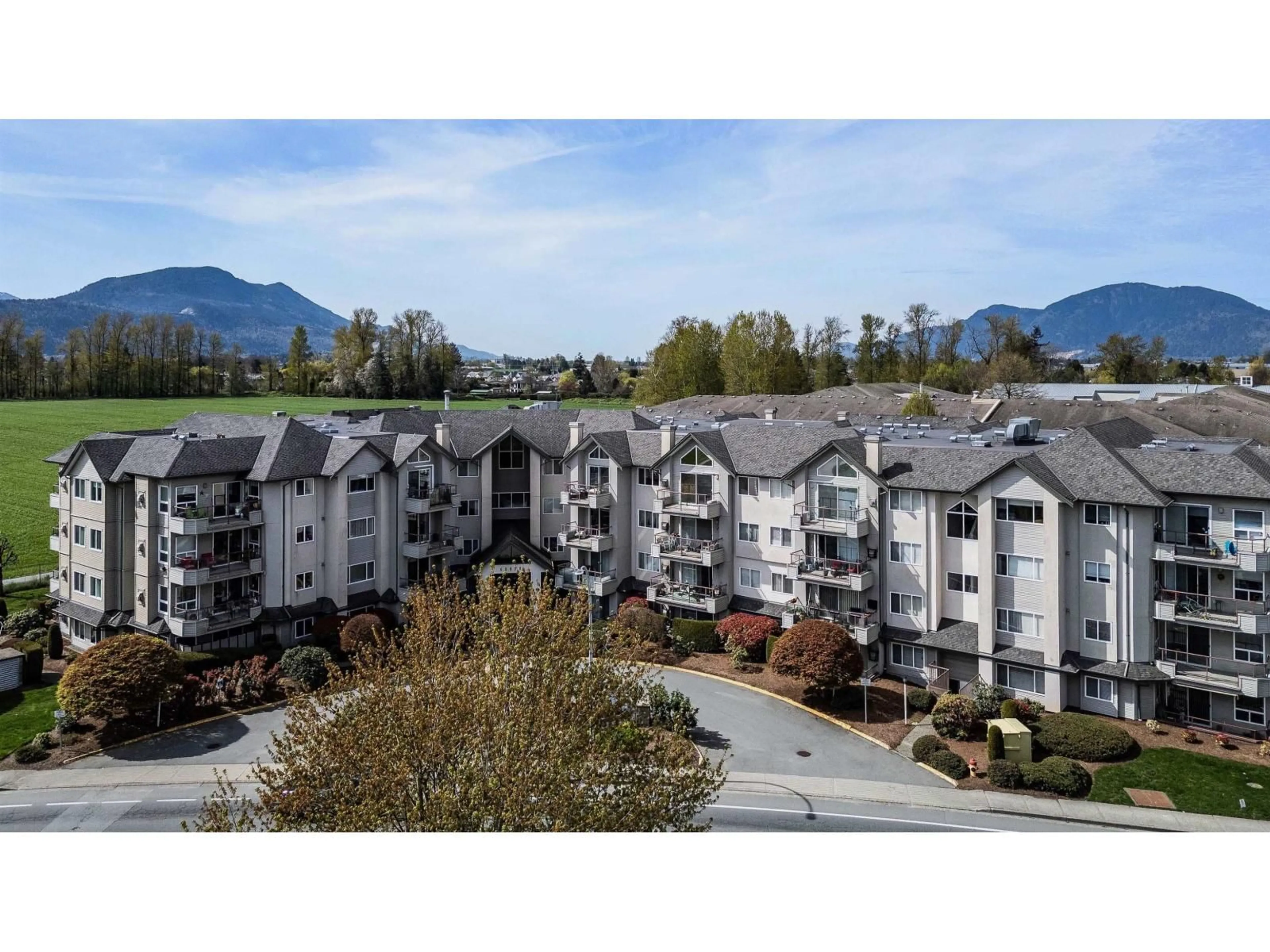 A pic from outside/outdoor area/front of a property/back of a property/a pic from drone, mountain view for 313 - 45520 KNIGHT ROAD, Chilliwack British Columbia V2R3Z2