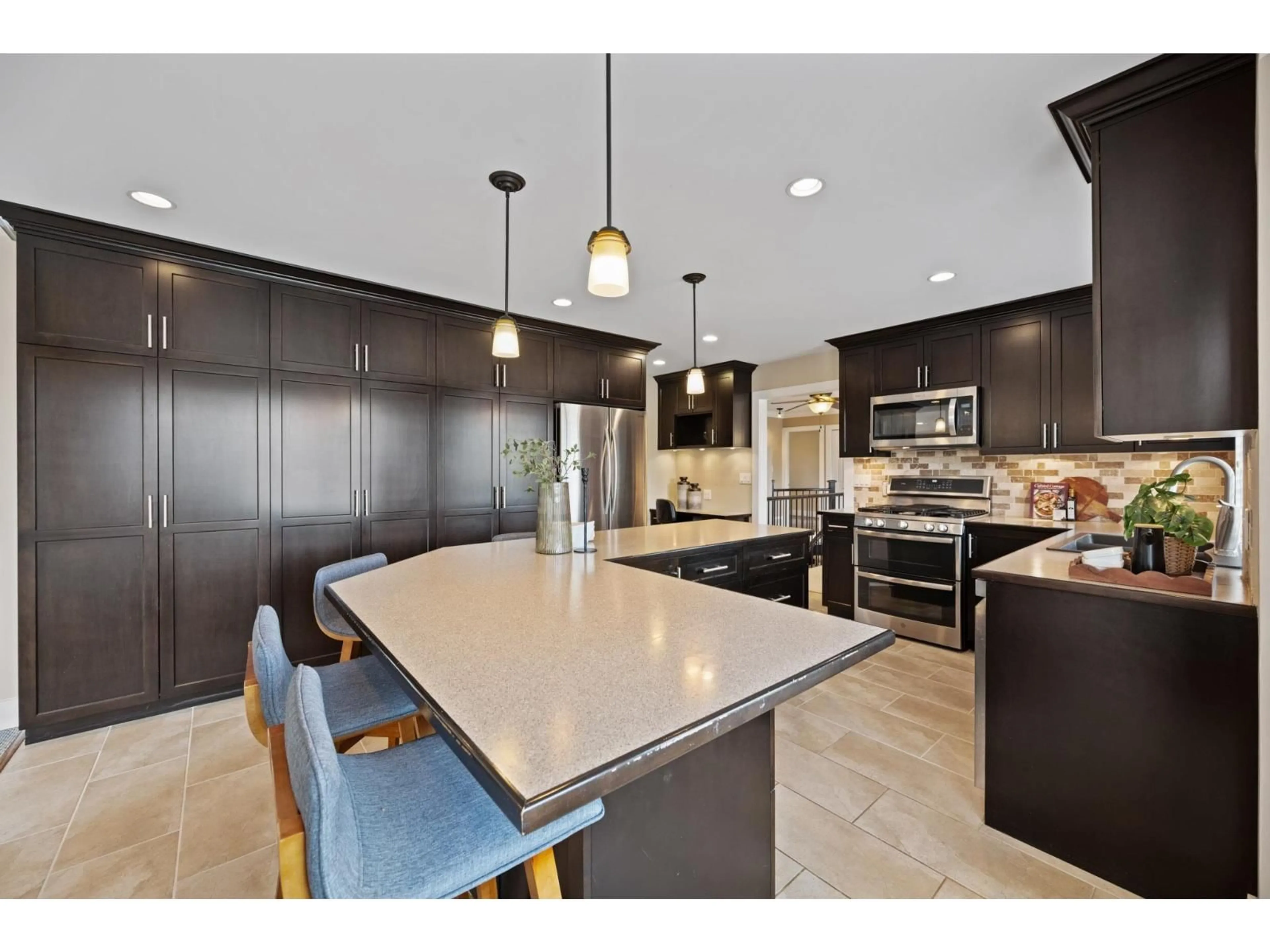 Open concept kitchen, ceramic/tile floor for 15866 91 AVENUE, Surrey British Columbia V4N2X4