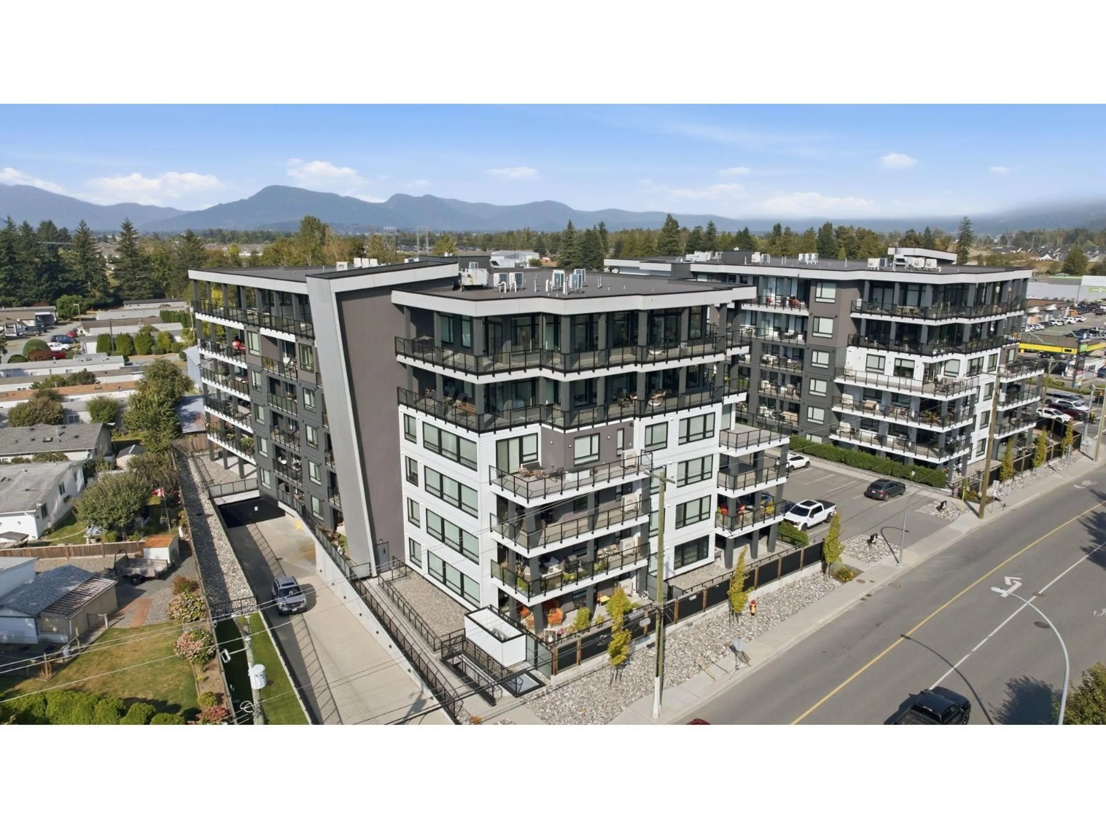 A pic from outside/outdoor area/front of a property/back of a property/a pic from drone, mountain view for 106 - 45745 WATSON ROAD, Chilliwack British Columbia V2R6K3