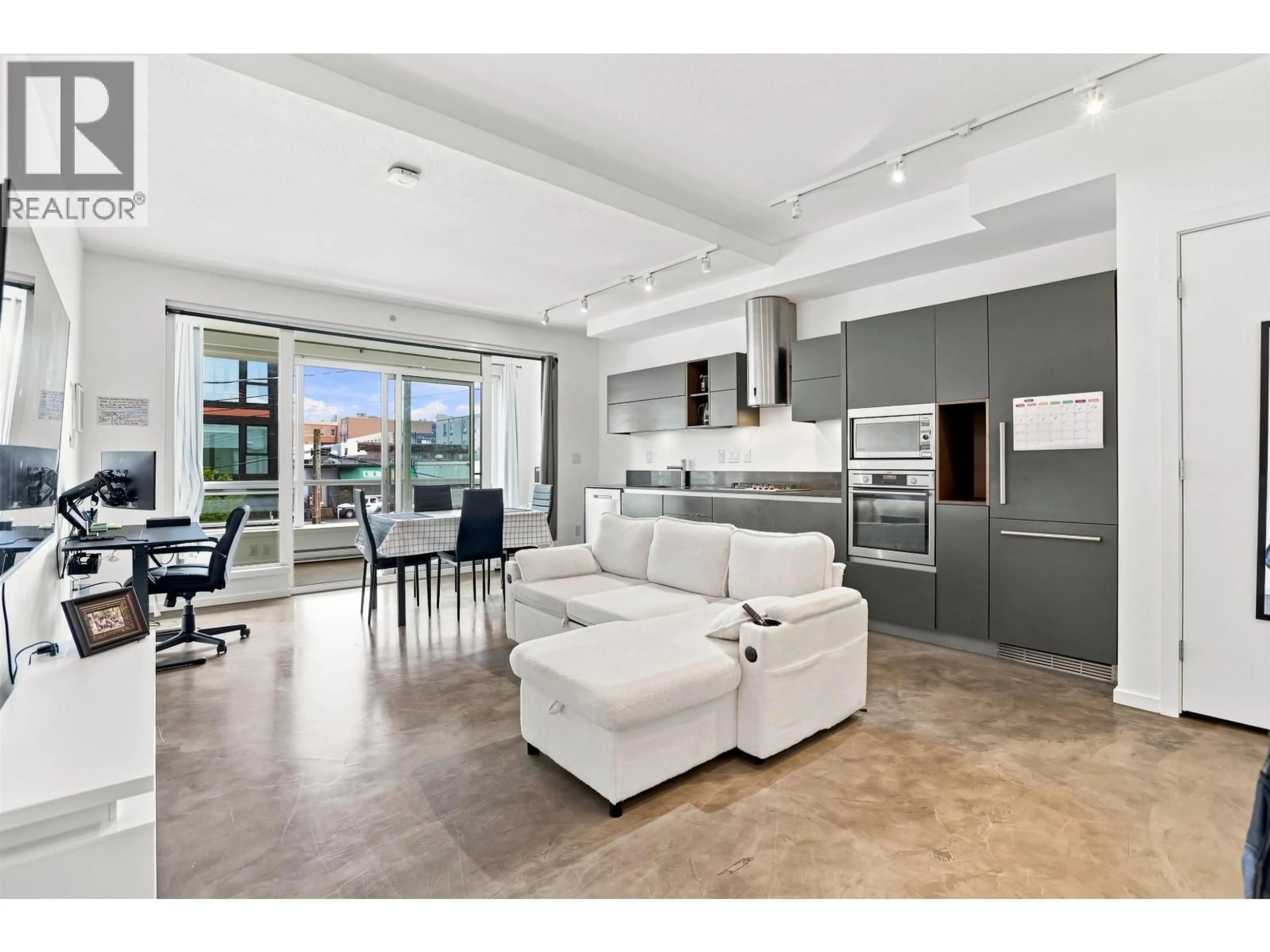 Open concept kitchen, ceramic/tile floor for 209 - 133 8TH AVENUE, Vancouver British Columbia V5T1R8