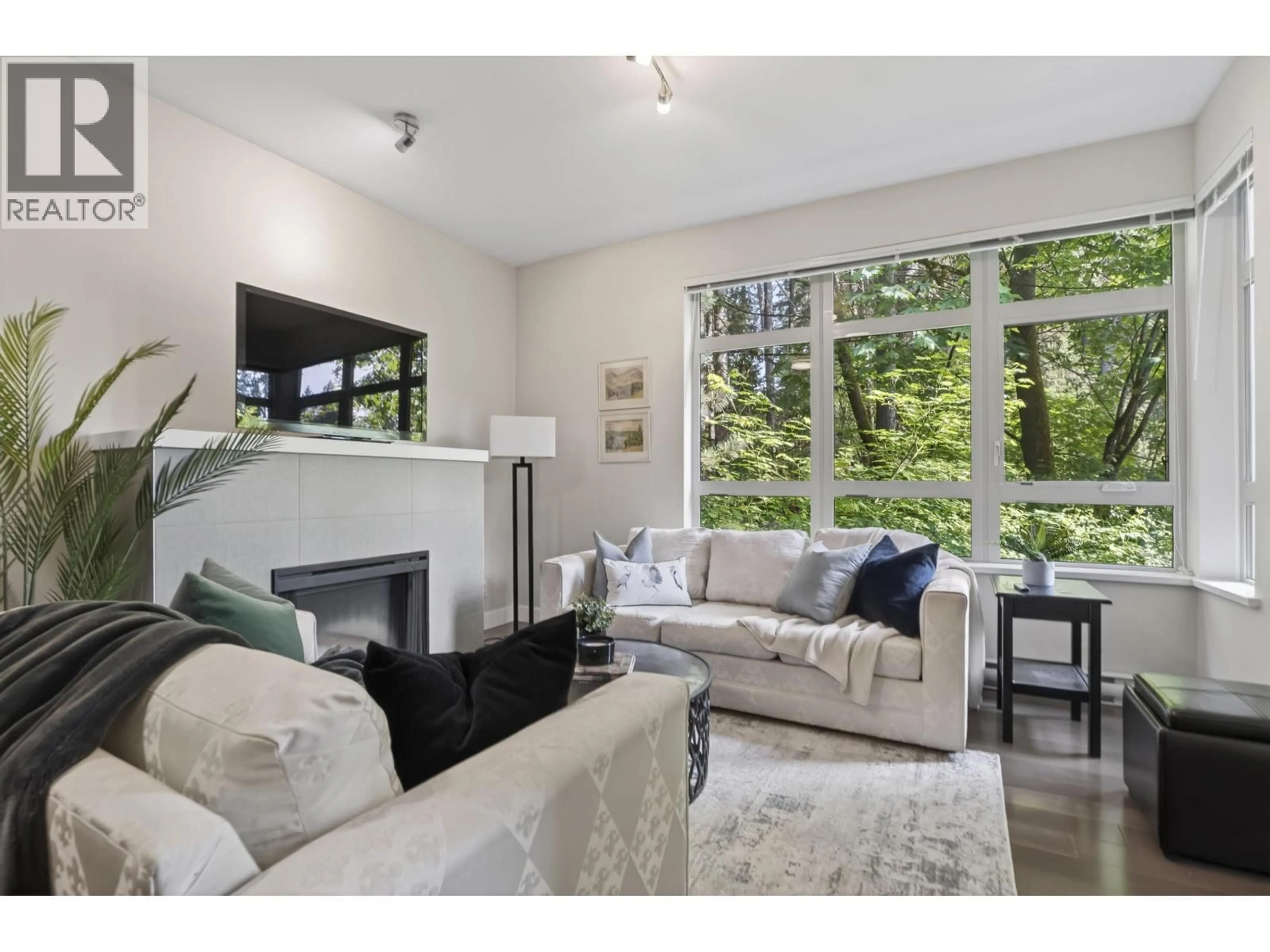 Living room with furniture, unknown for 202 - 3294 MT SEYMOUR PARKWAY, North Vancouver British Columbia V7H0B1