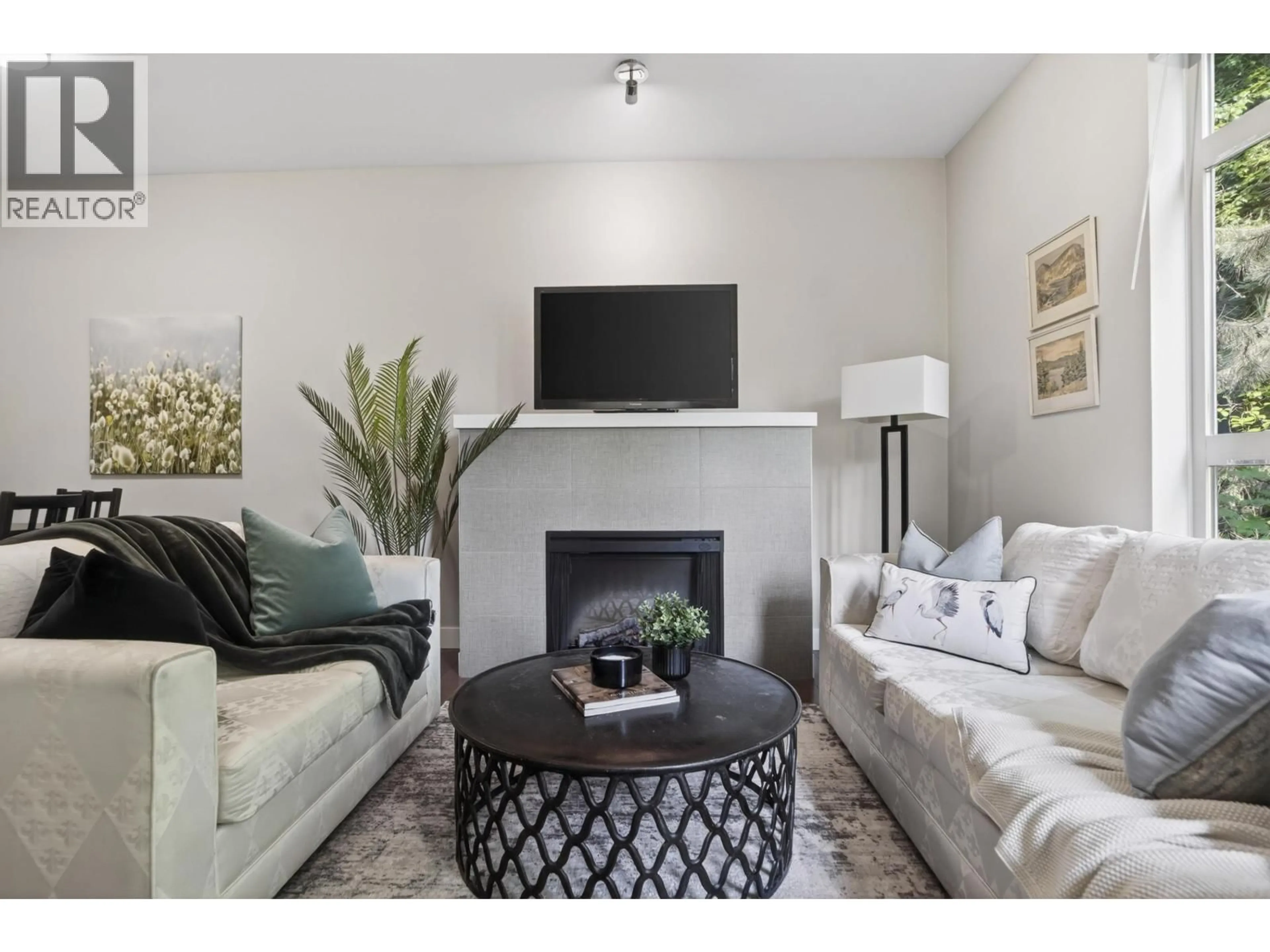 Living room with furniture, unknown for 202 - 3294 MT SEYMOUR PARKWAY, North Vancouver British Columbia V7H0B1
