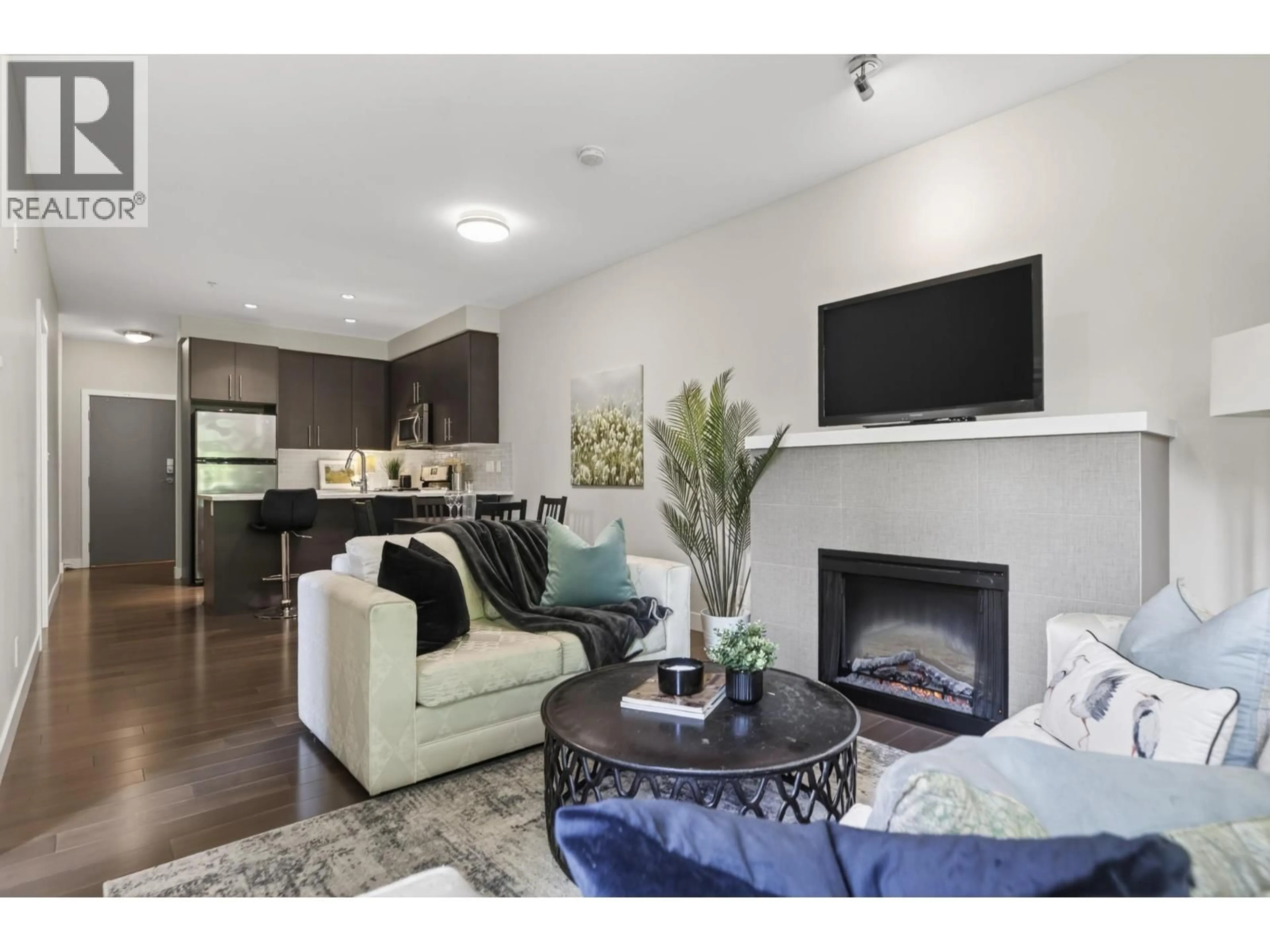 Living room with furniture, unknown for 202 - 3294 MT SEYMOUR PARKWAY, North Vancouver British Columbia V7H0B1