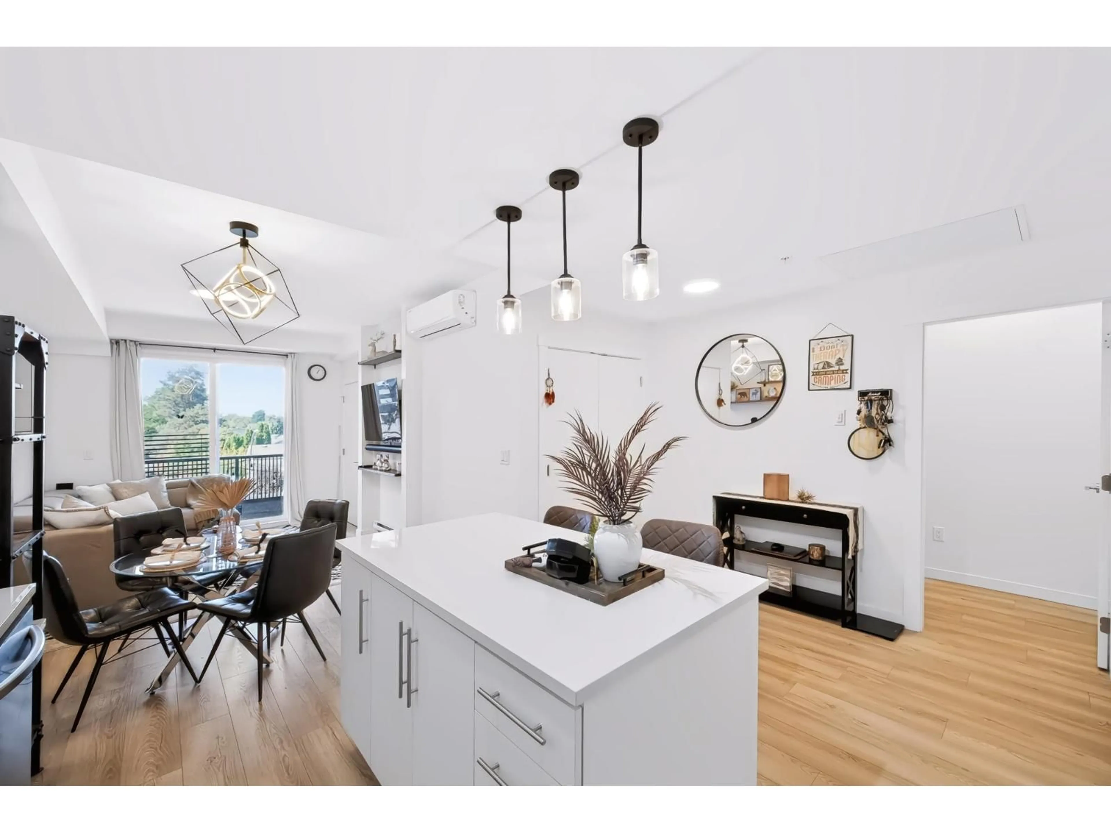 Open concept kitchen, wood/laminate floor for 303 - 5420 208 STREET, Langley British Columbia V3A2J9