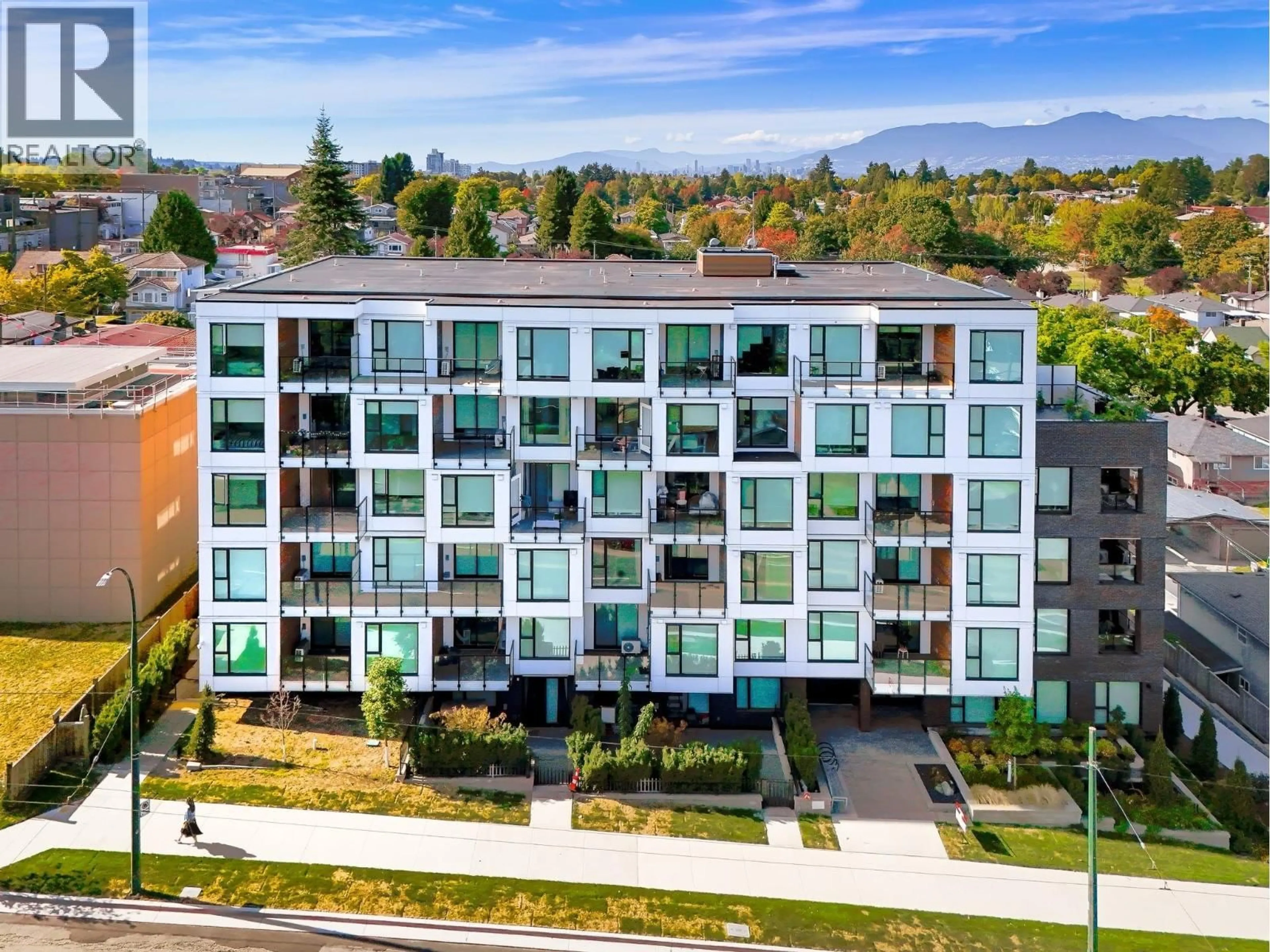 A pic from outside/outdoor area/front of a property/back of a property/a pic from drone, city buildings view from balcony for 406 - 5399 JOYCE STREET, Vancouver British Columbia V5R4H3